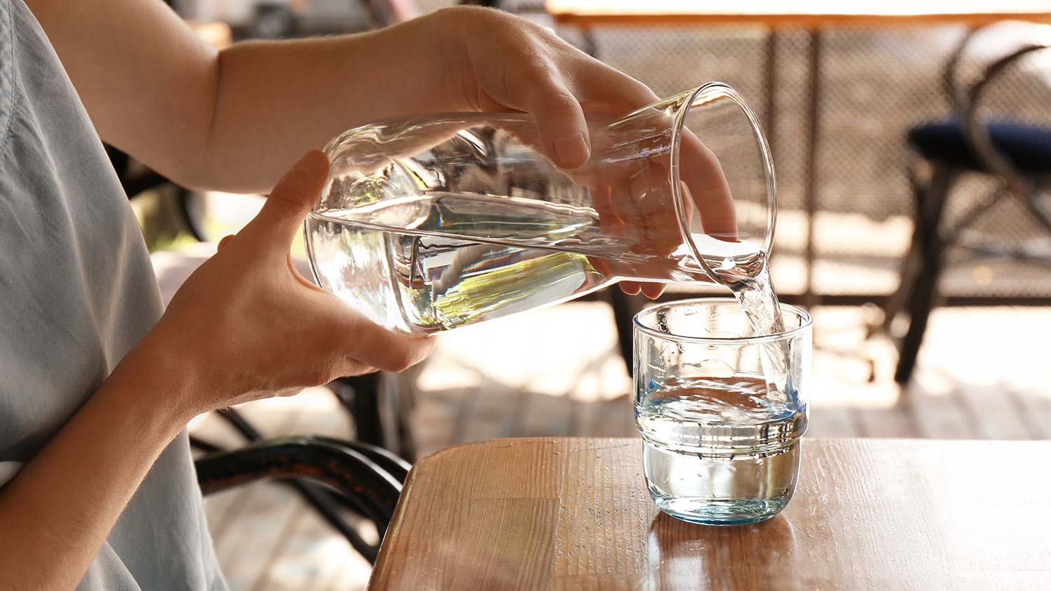 Pouring water into glass