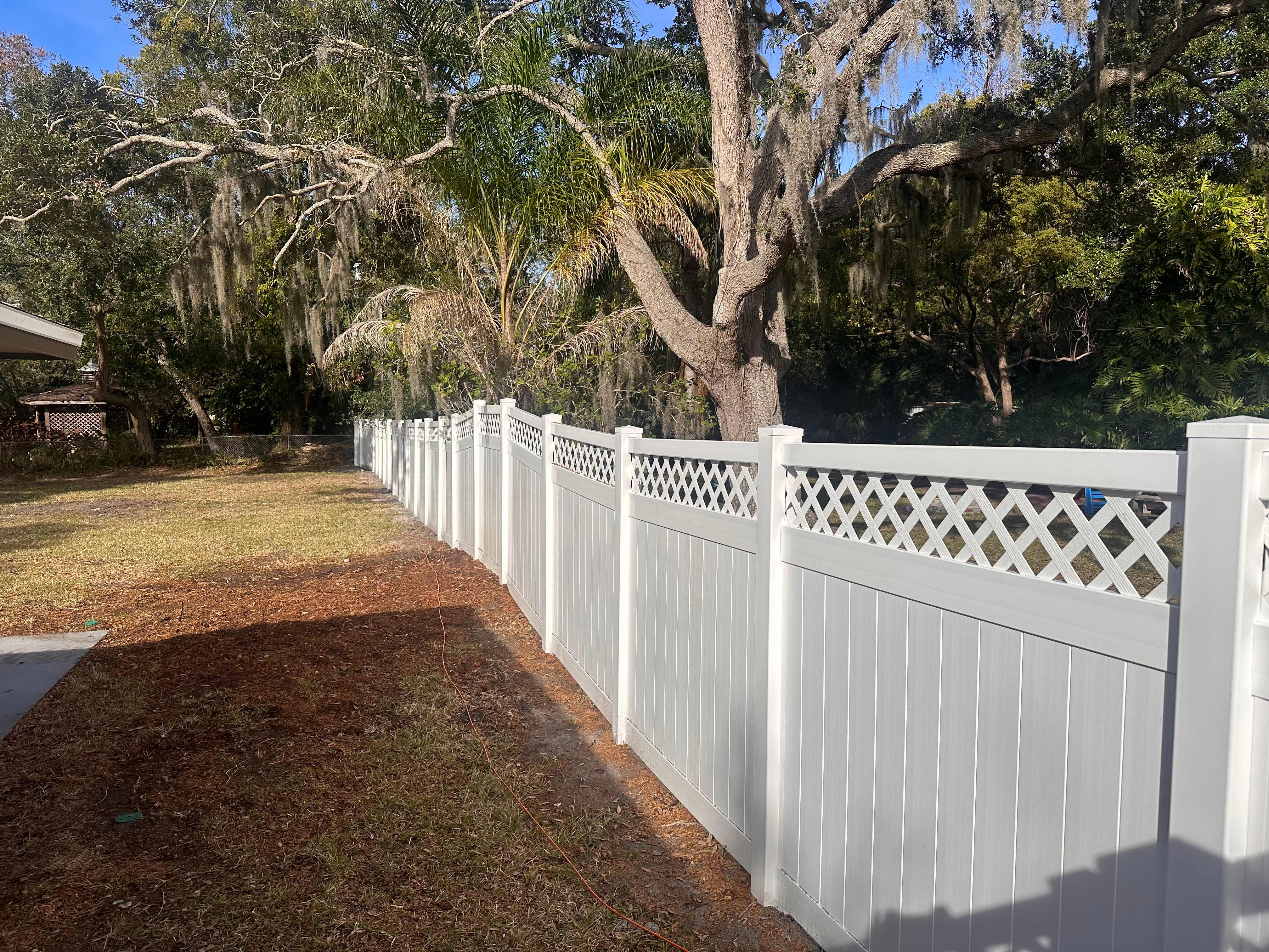 white vinyl fence