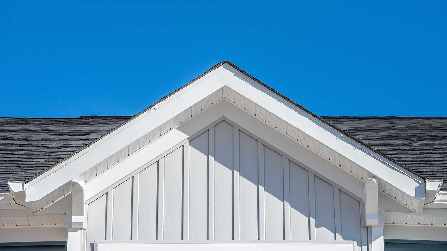 Detail of a house with board and batten vinyl siding