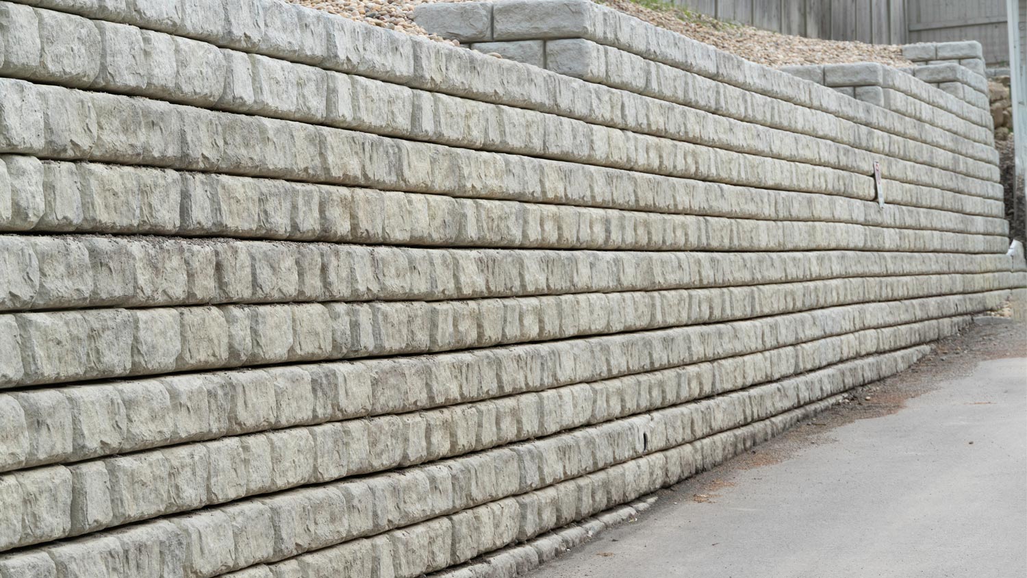 Gray retaining wall in driveway