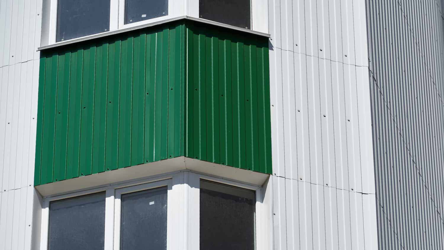 Green metal siding