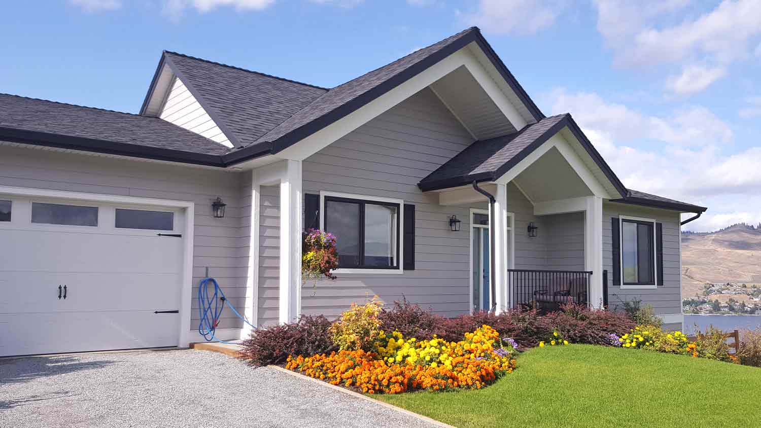 small house with grey siding