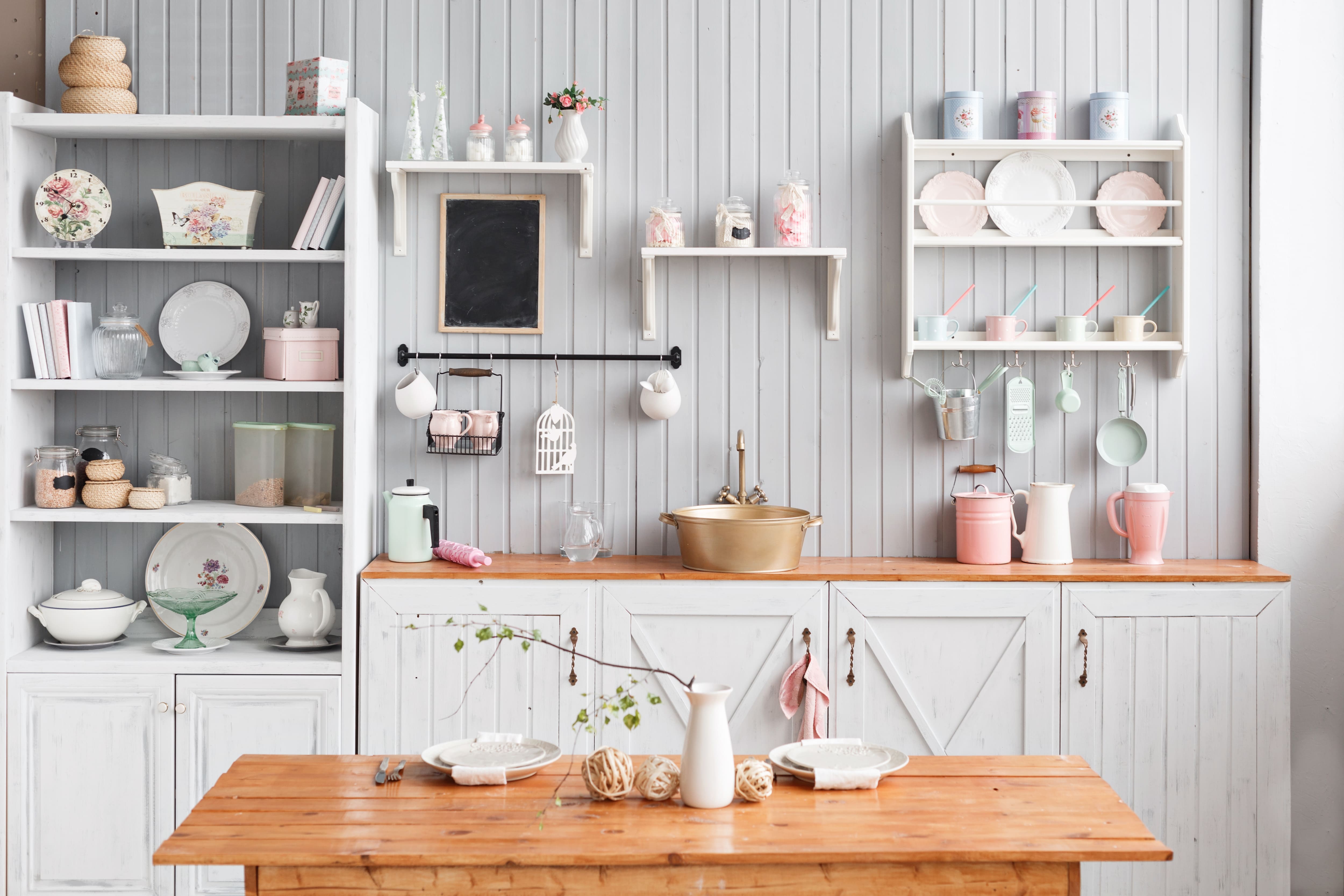 Gray panel accent wall in kitchen with open shelving