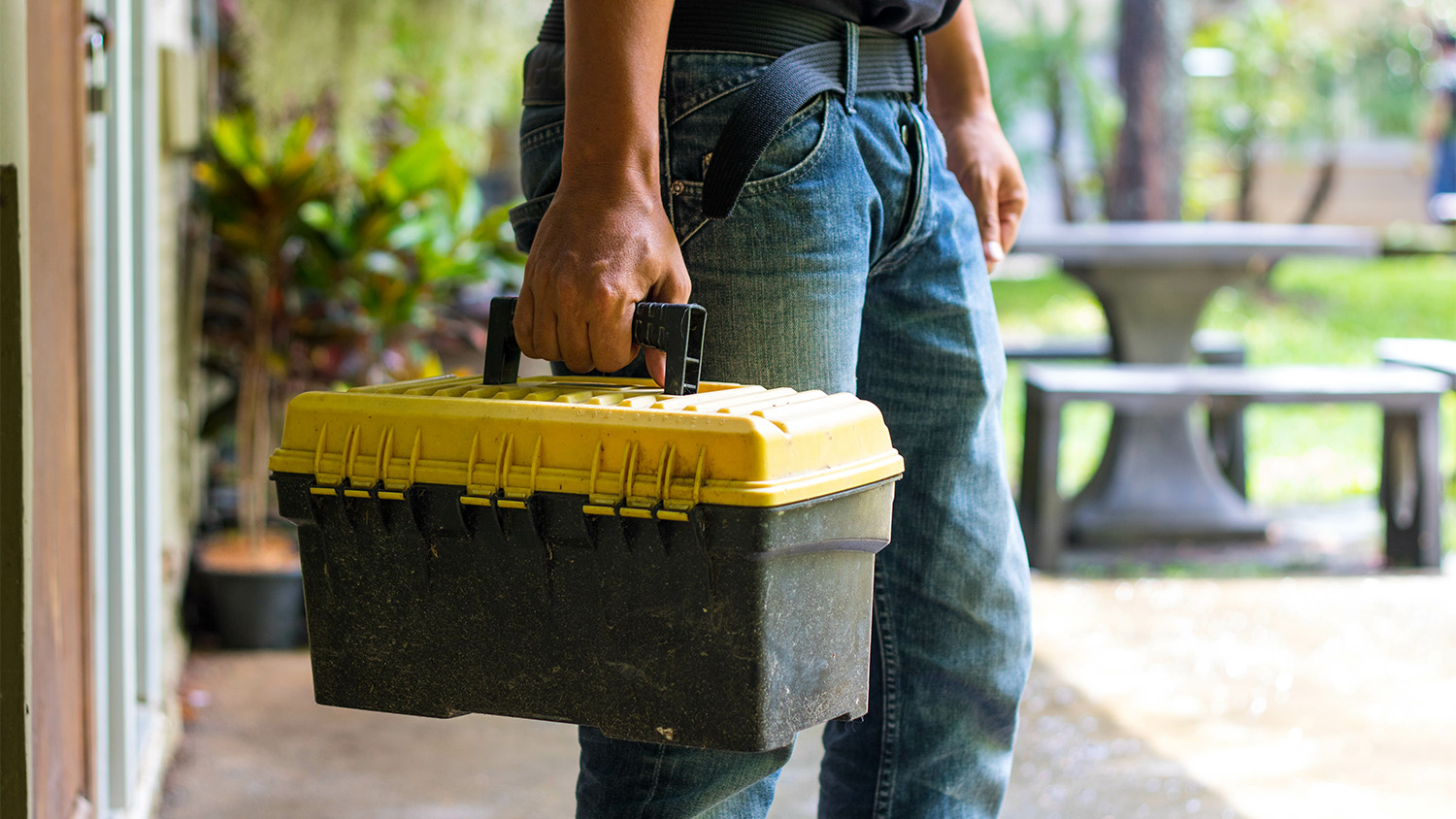 handyman holding a toolbox