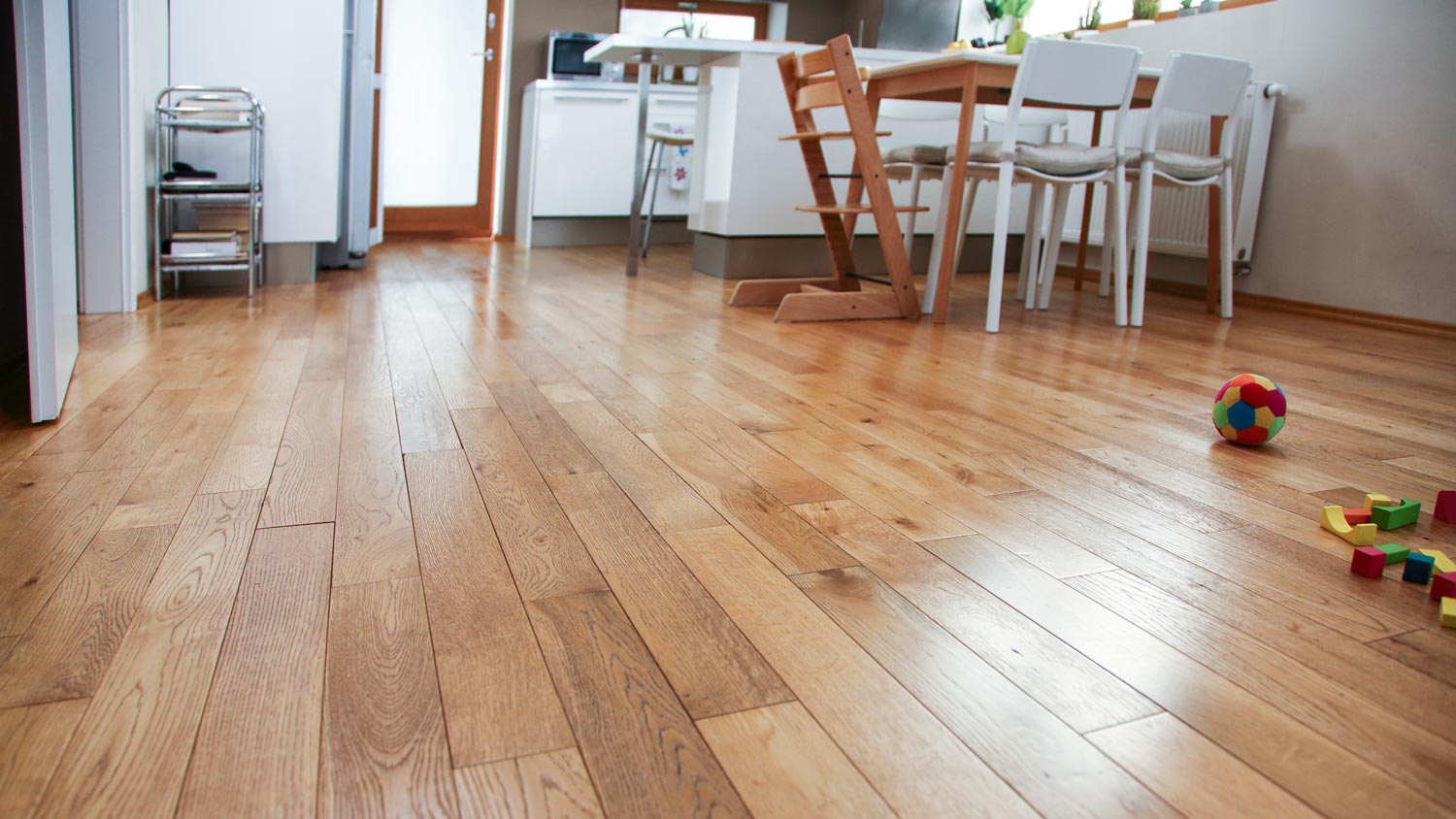Close-up of hardwood floor in a kitchen