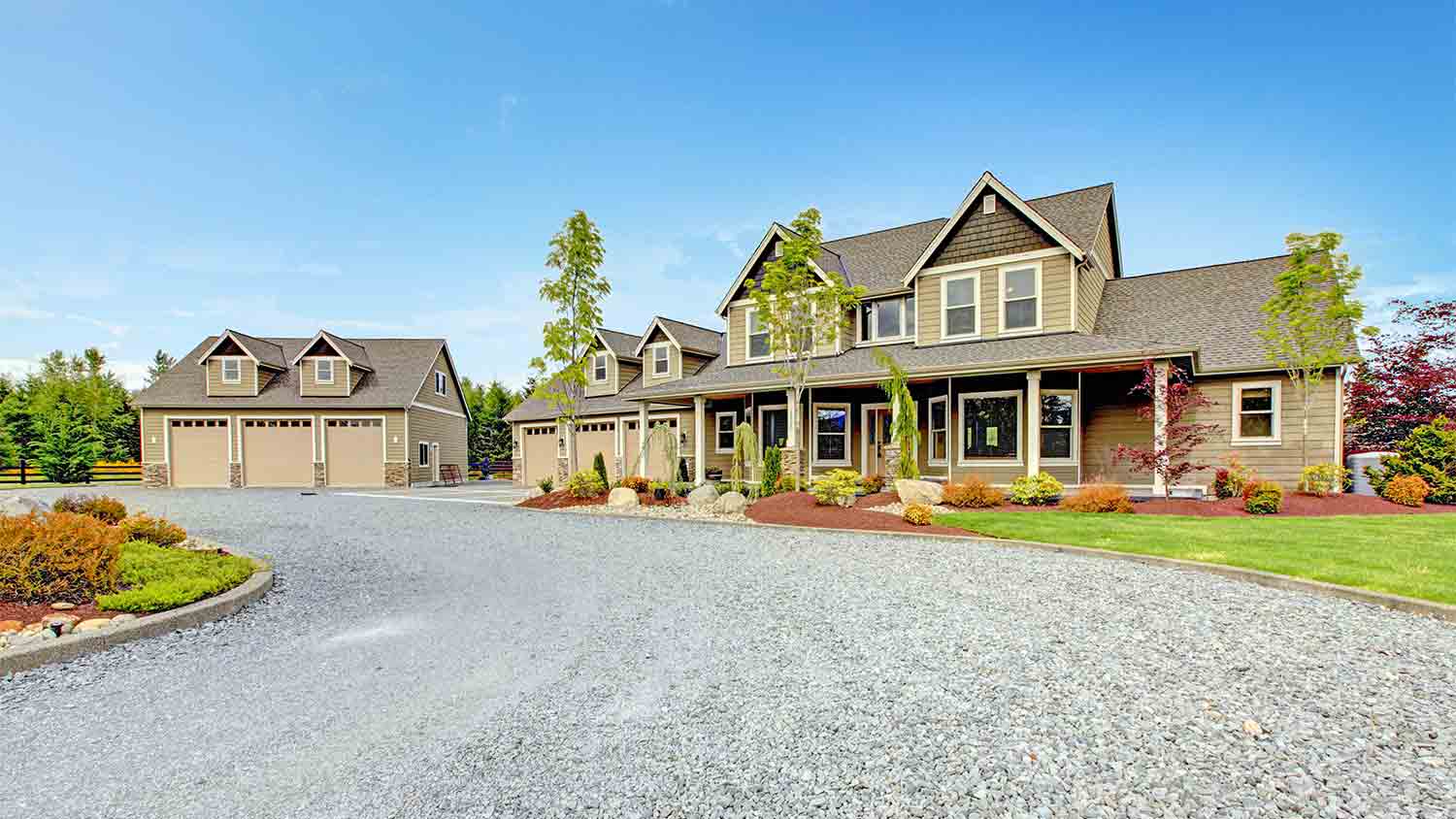 farm country house with gravel driveway