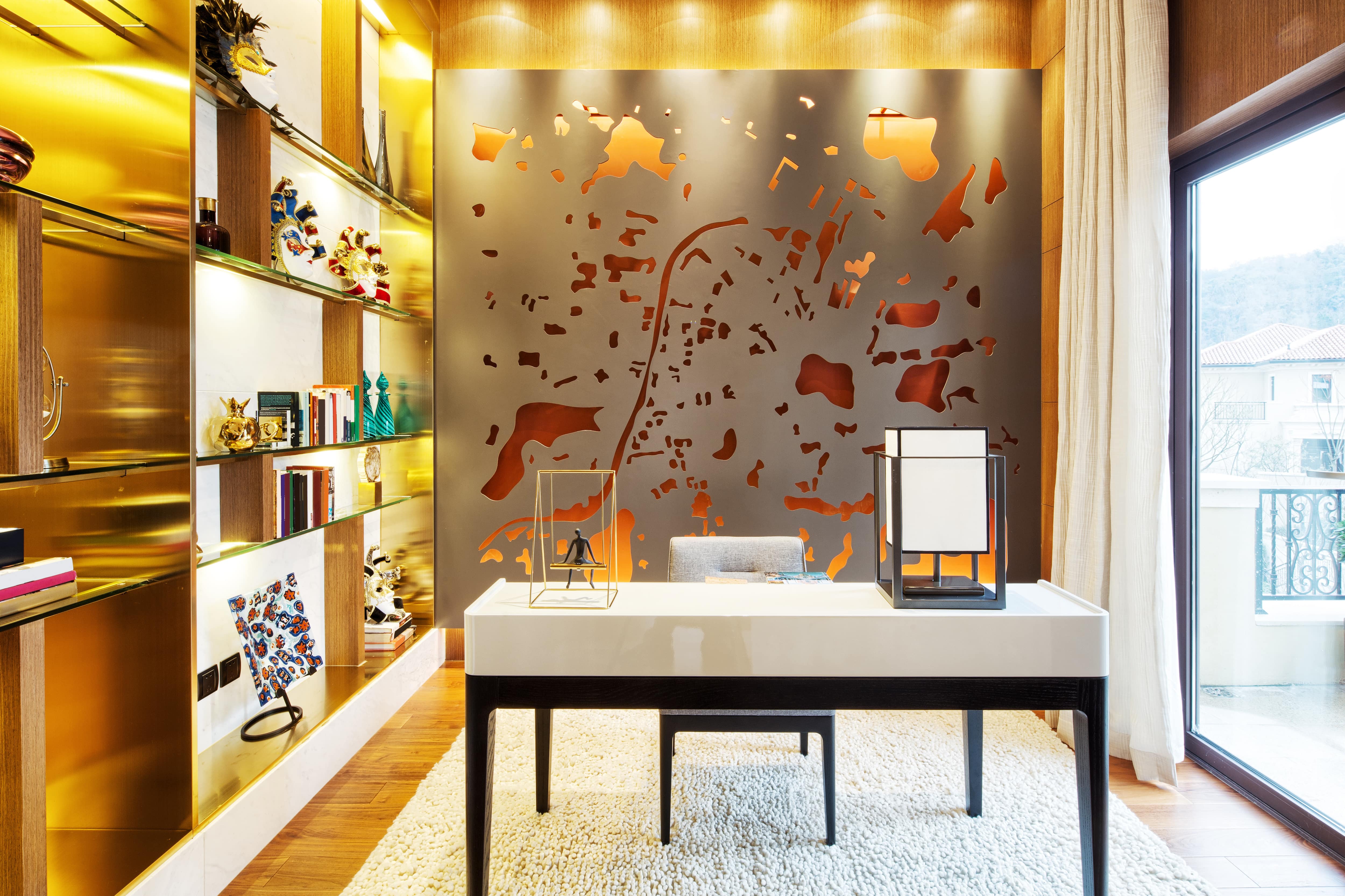 Modern study with metal wall sculpture