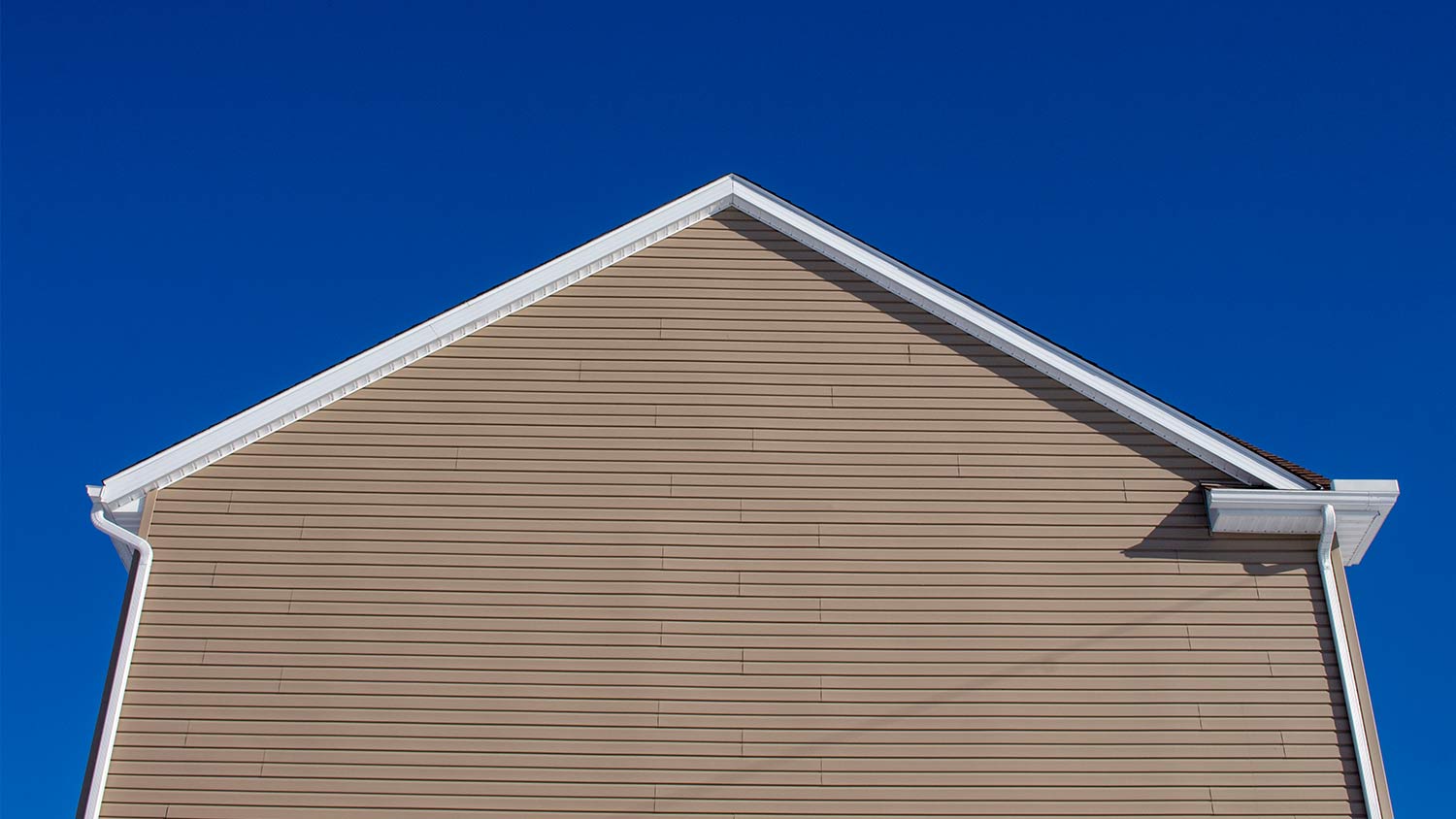 house with rich warm brown siding