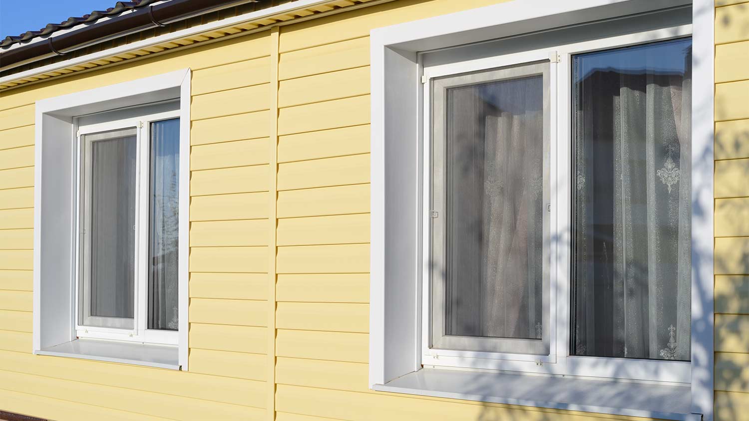 house with creamy yellow siding