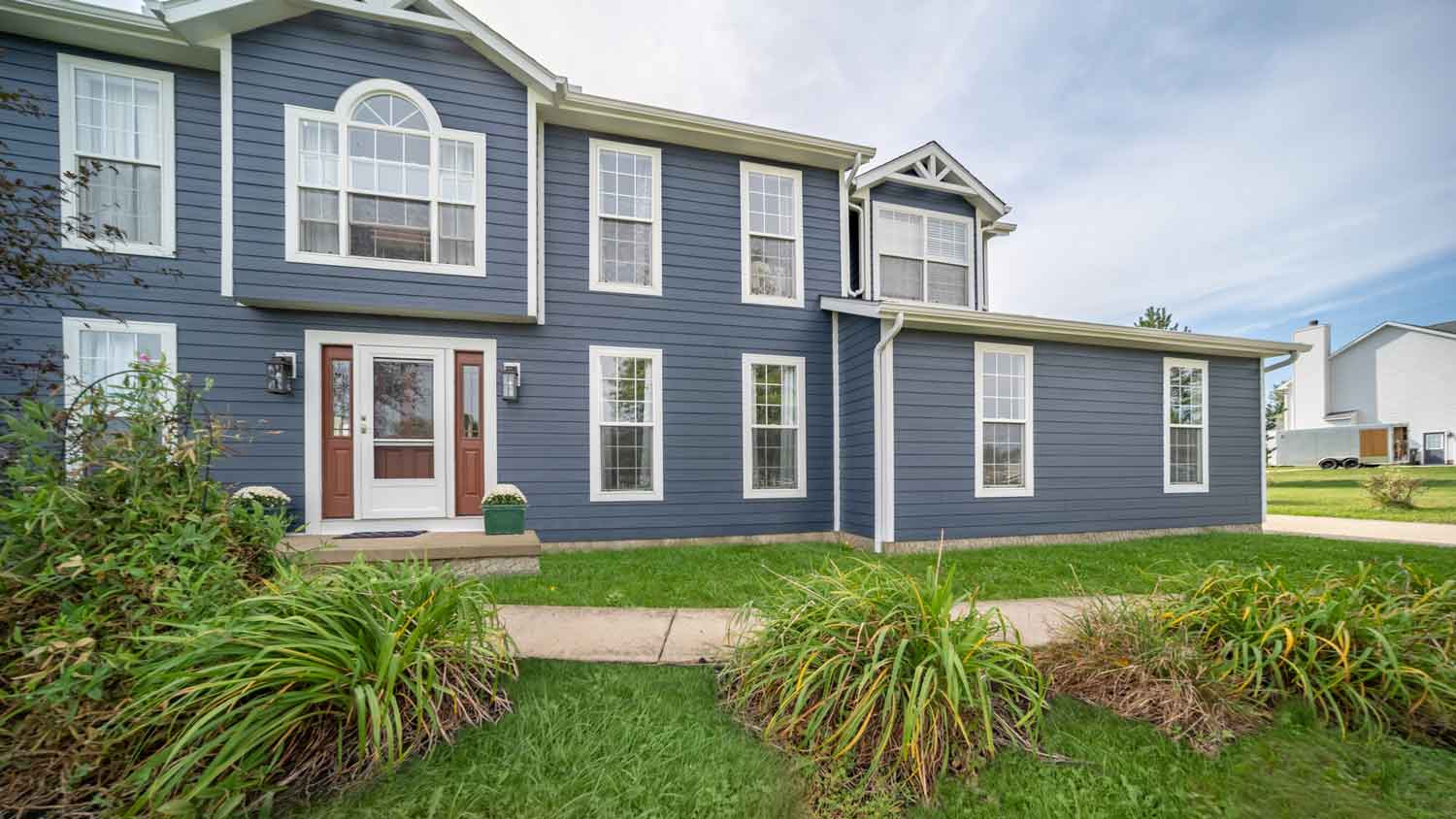 A house with blue Hardie board siding