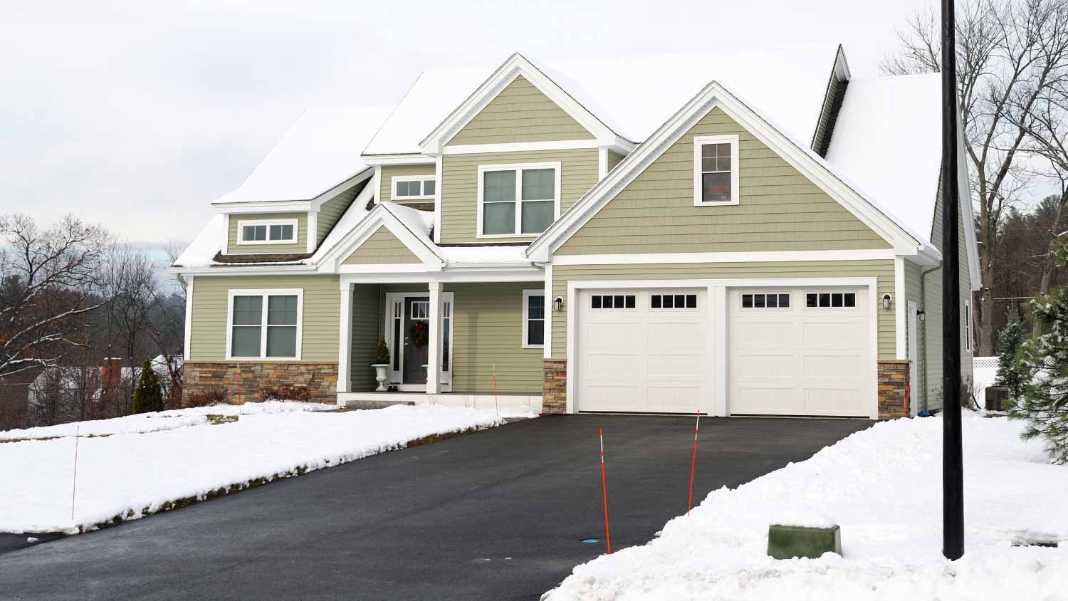 House in residential area after snow