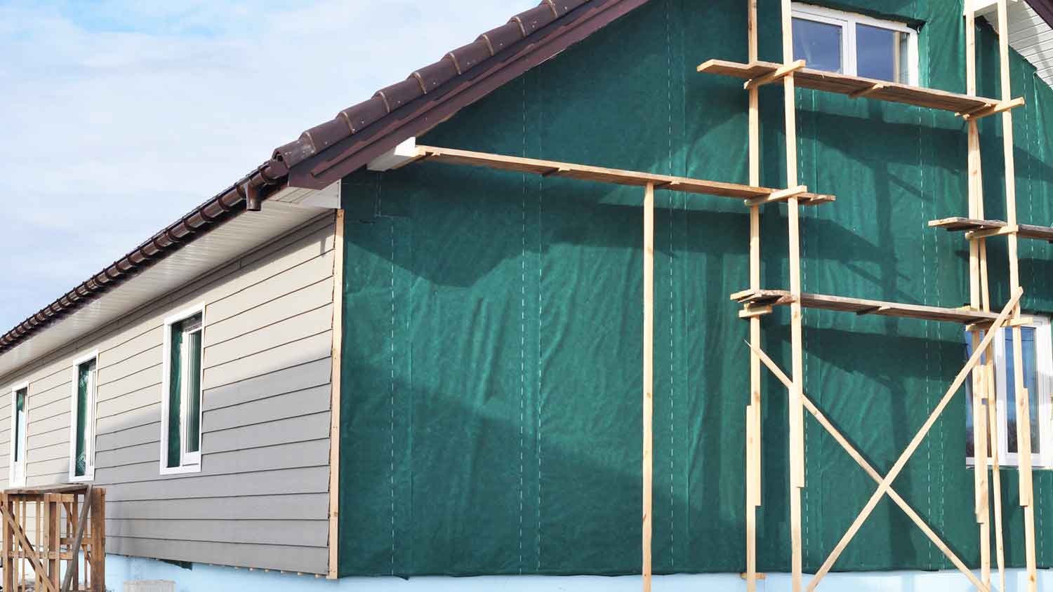 House siding halfway installed 