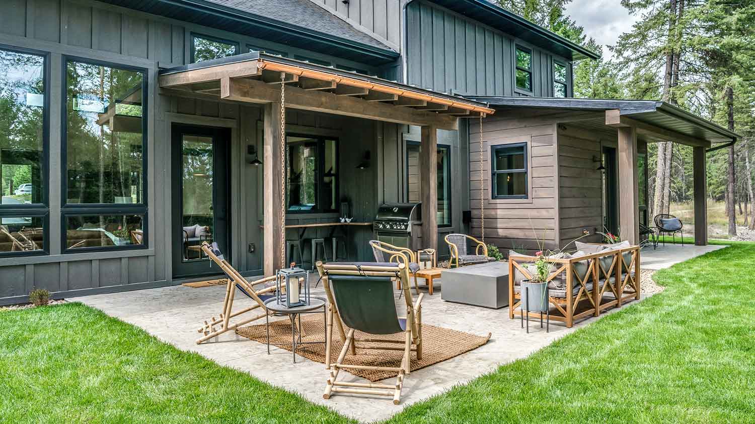 Concrete patio with furniture and a pergola
