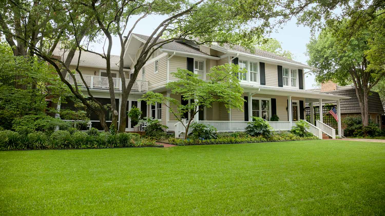 Two story house with lush front yard