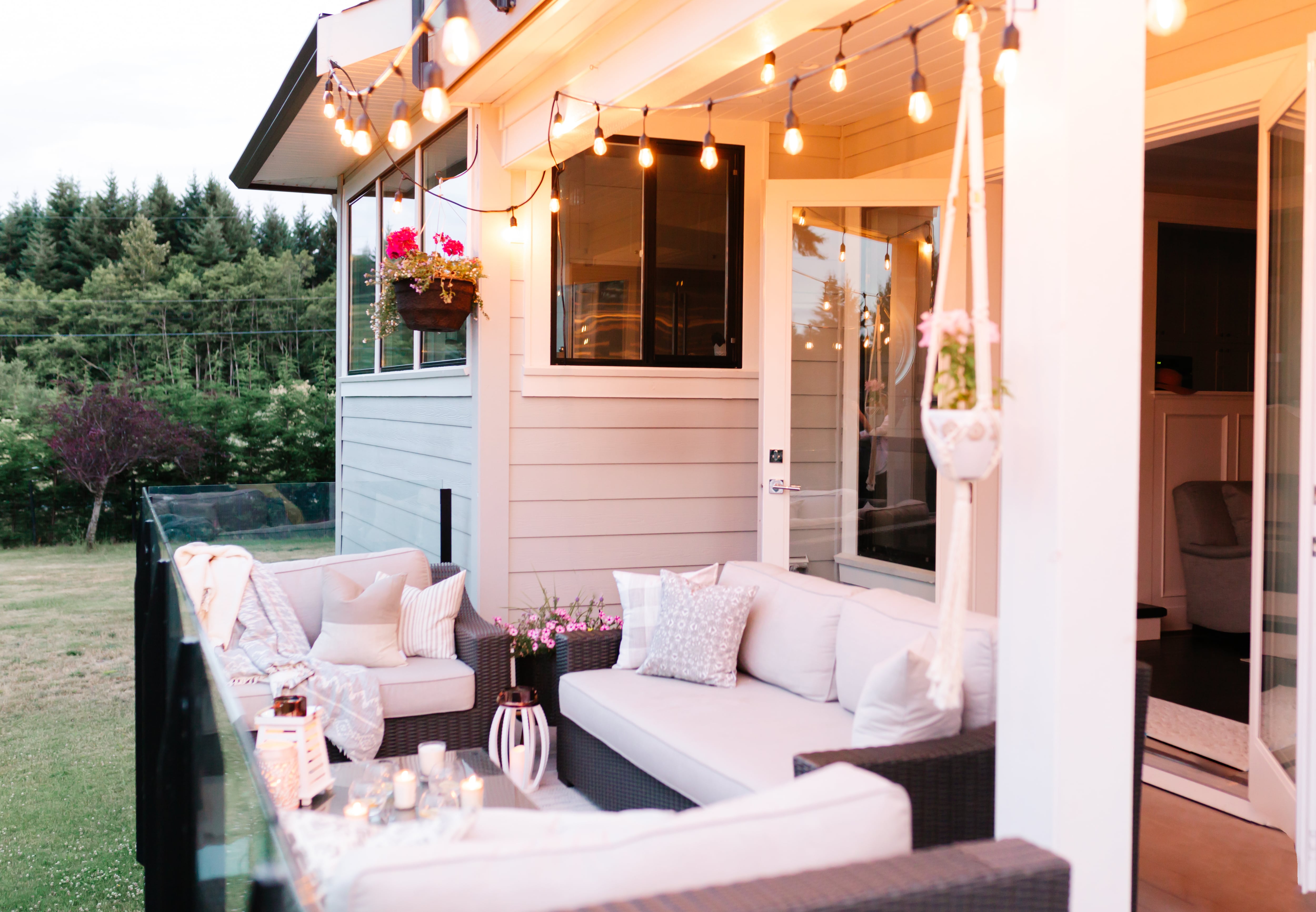 String lights hanging from back patio of home