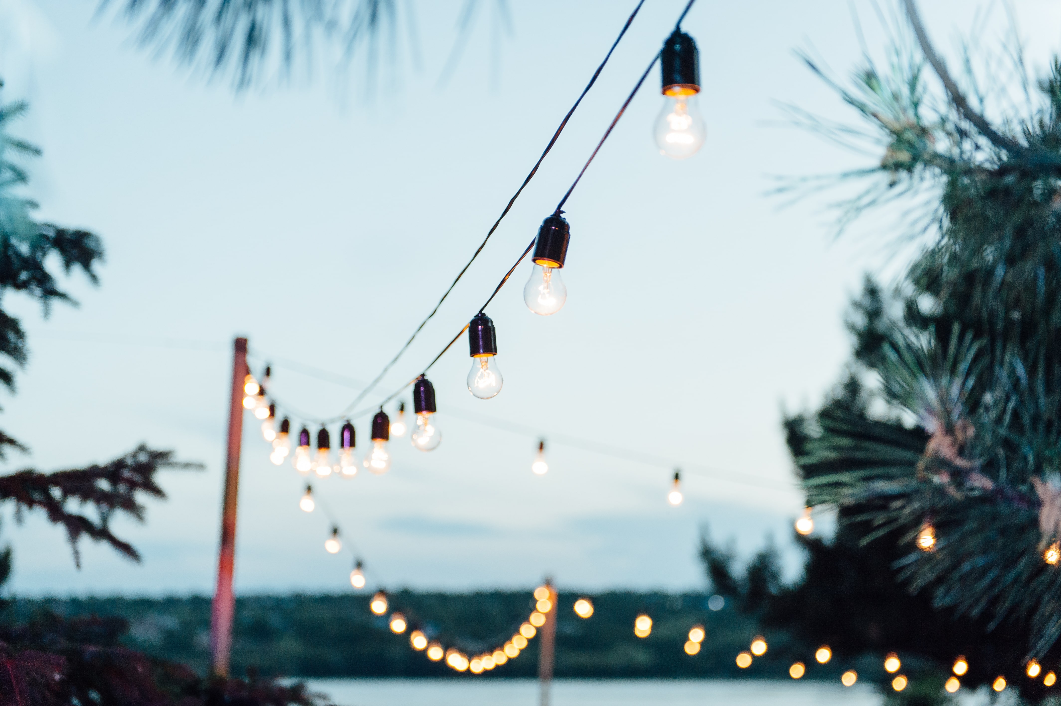 Outdoor string lights hung on posts