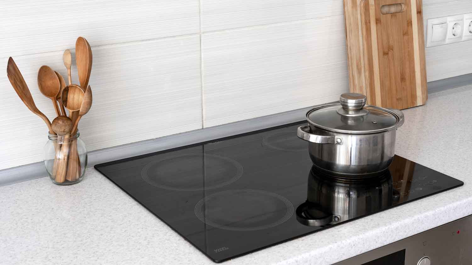 Induction stove top with magnetic cookware