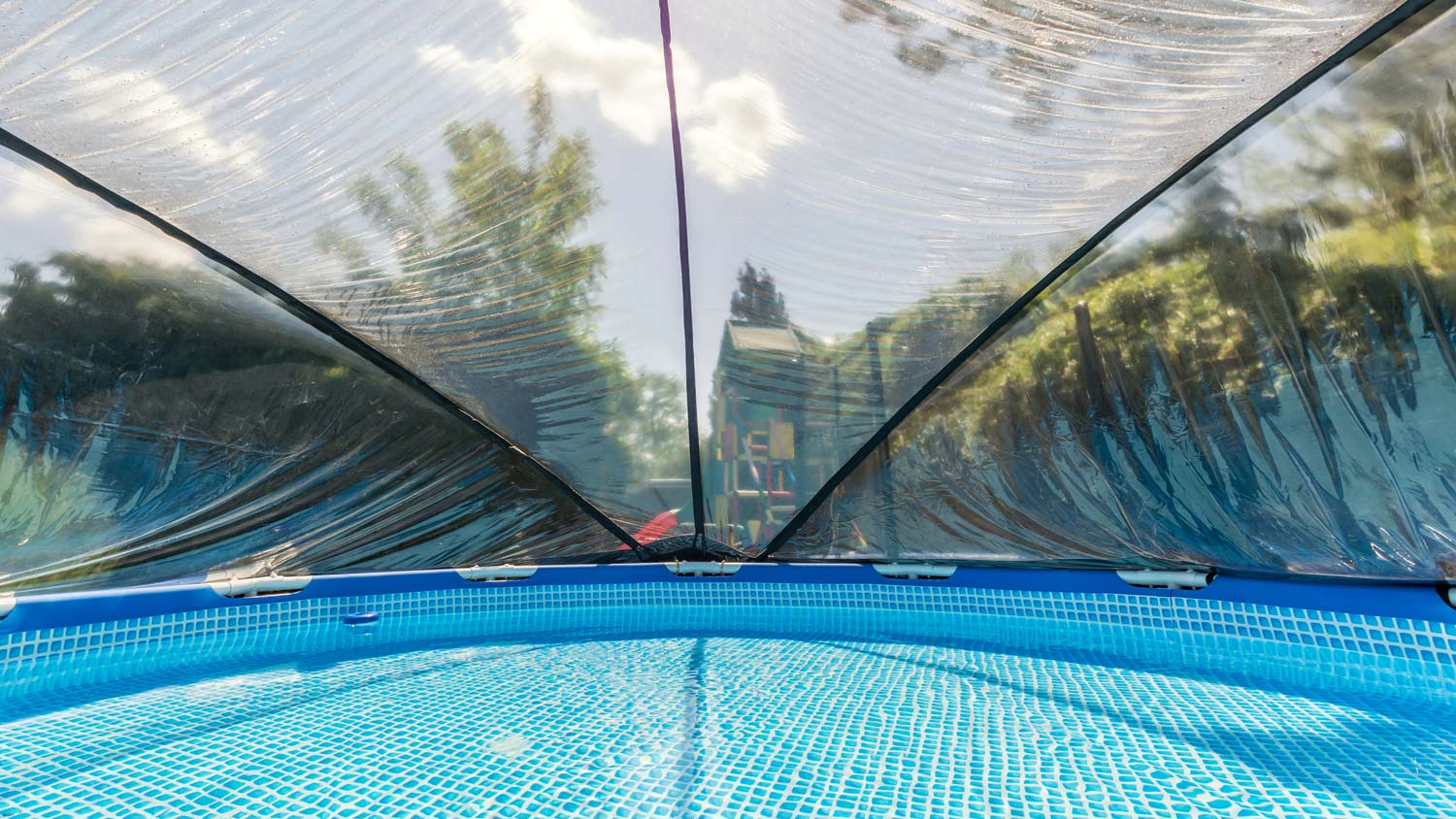 Pool roof over a pool as protection against weather conditions