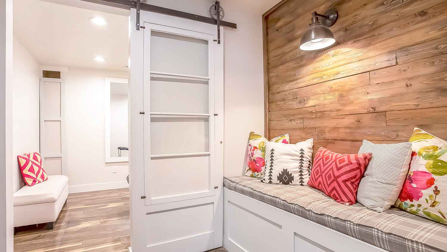 Sliding barn door in the mudroom