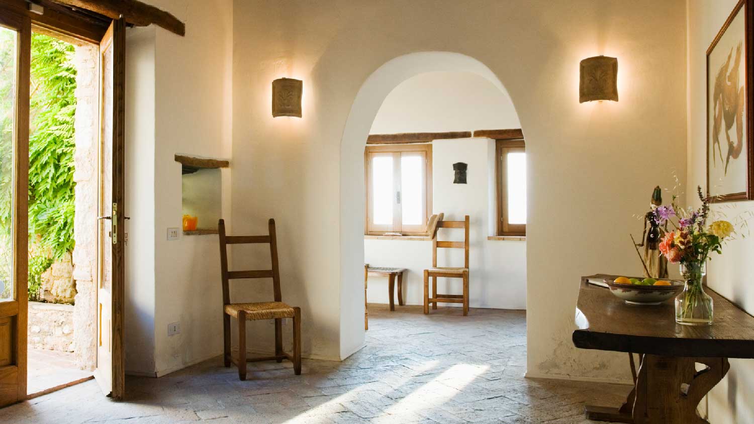 The interior of a house with stucco walls 