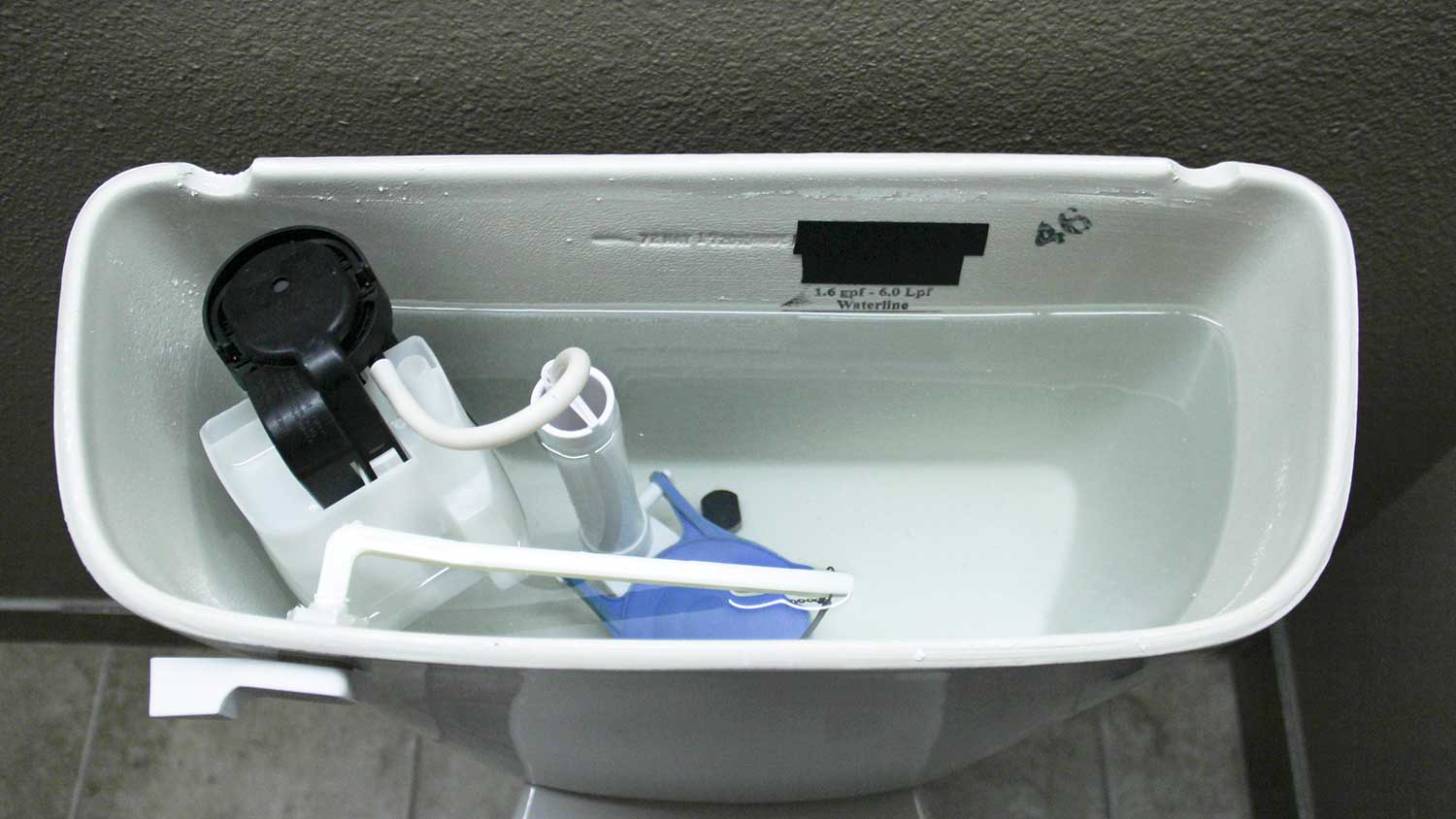 The interior of a toilet tank