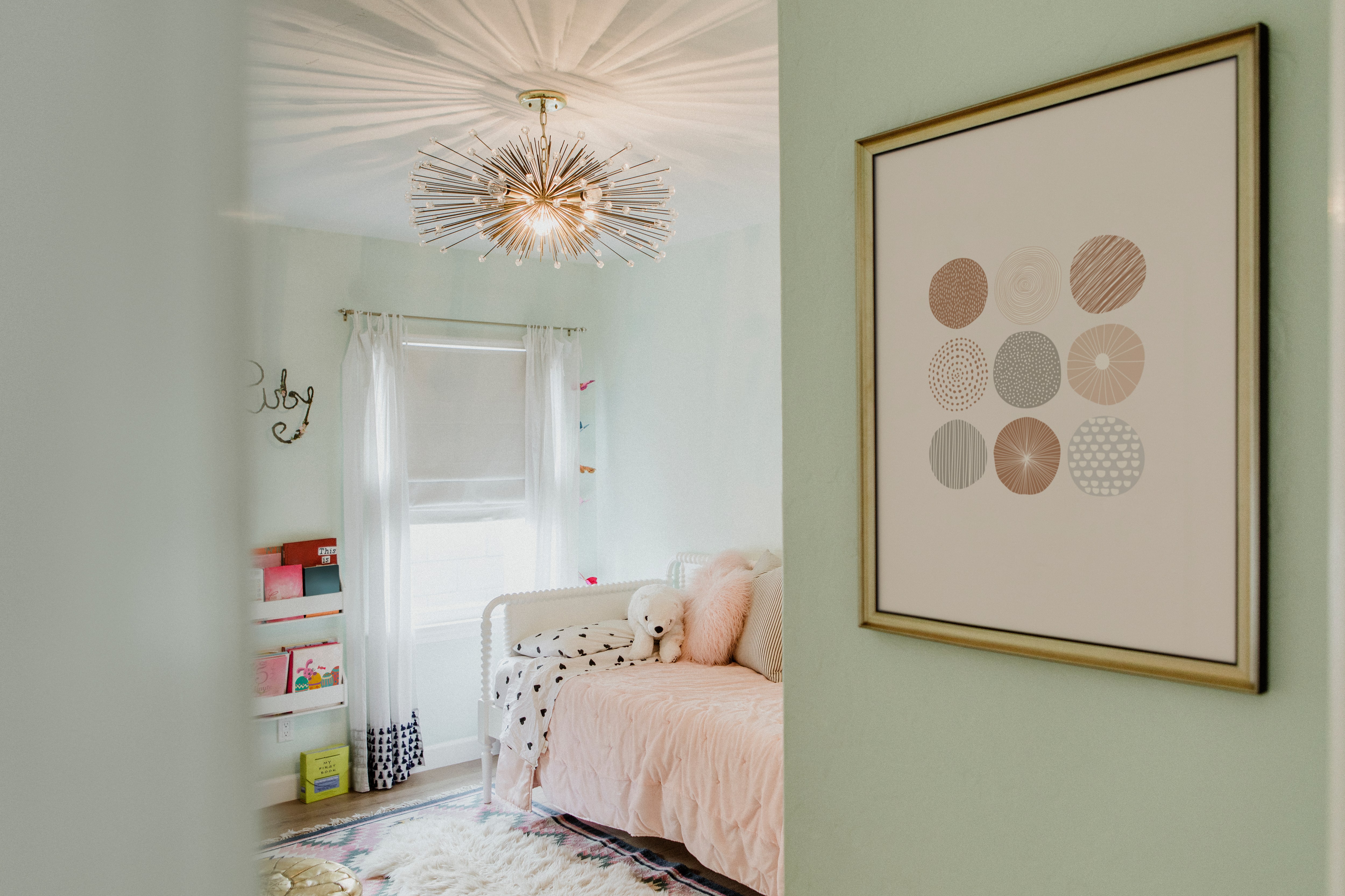 Kids’ bedroom with starburst pendant light