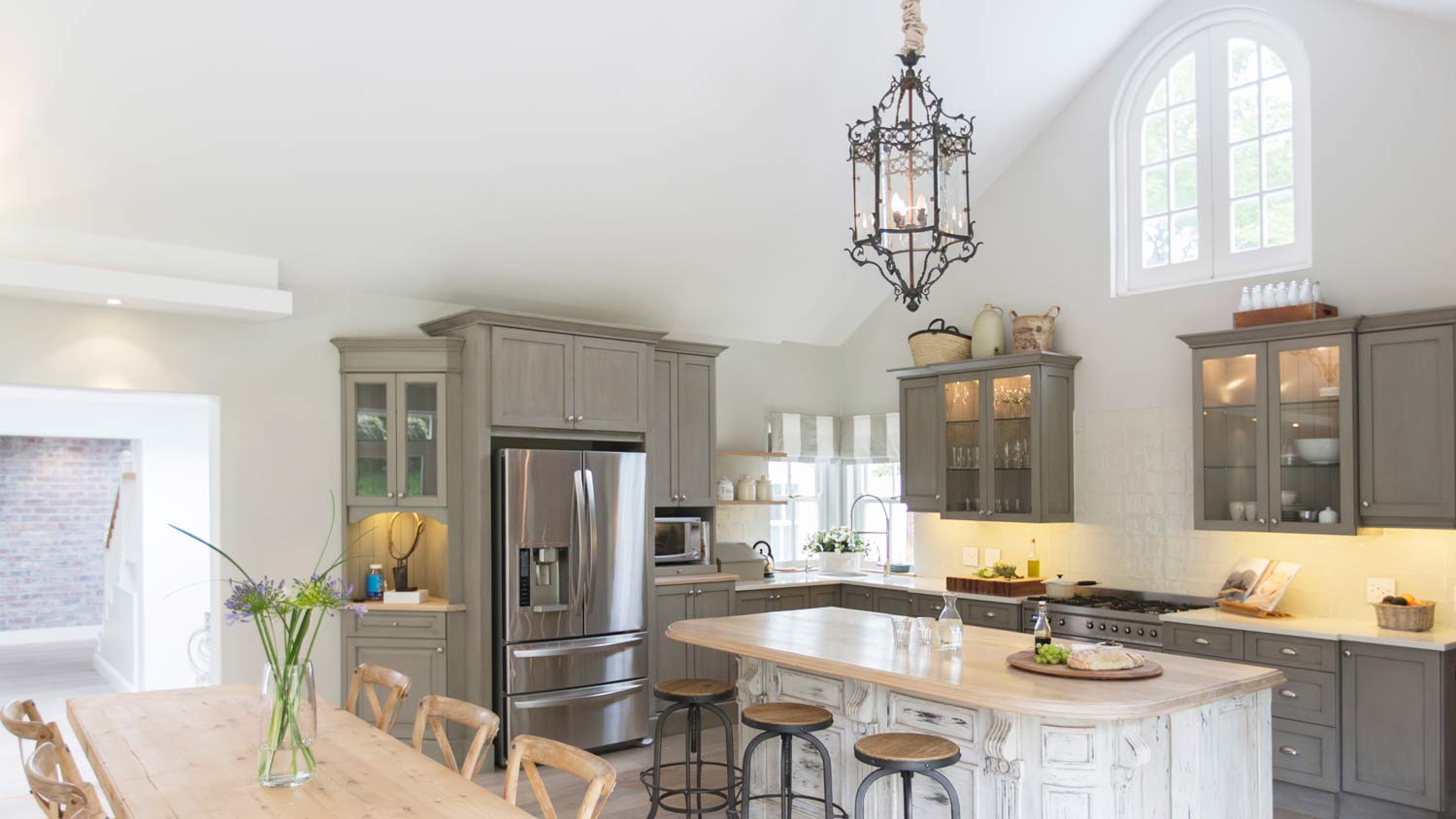 gothic chandelier in large luxury kitchen  