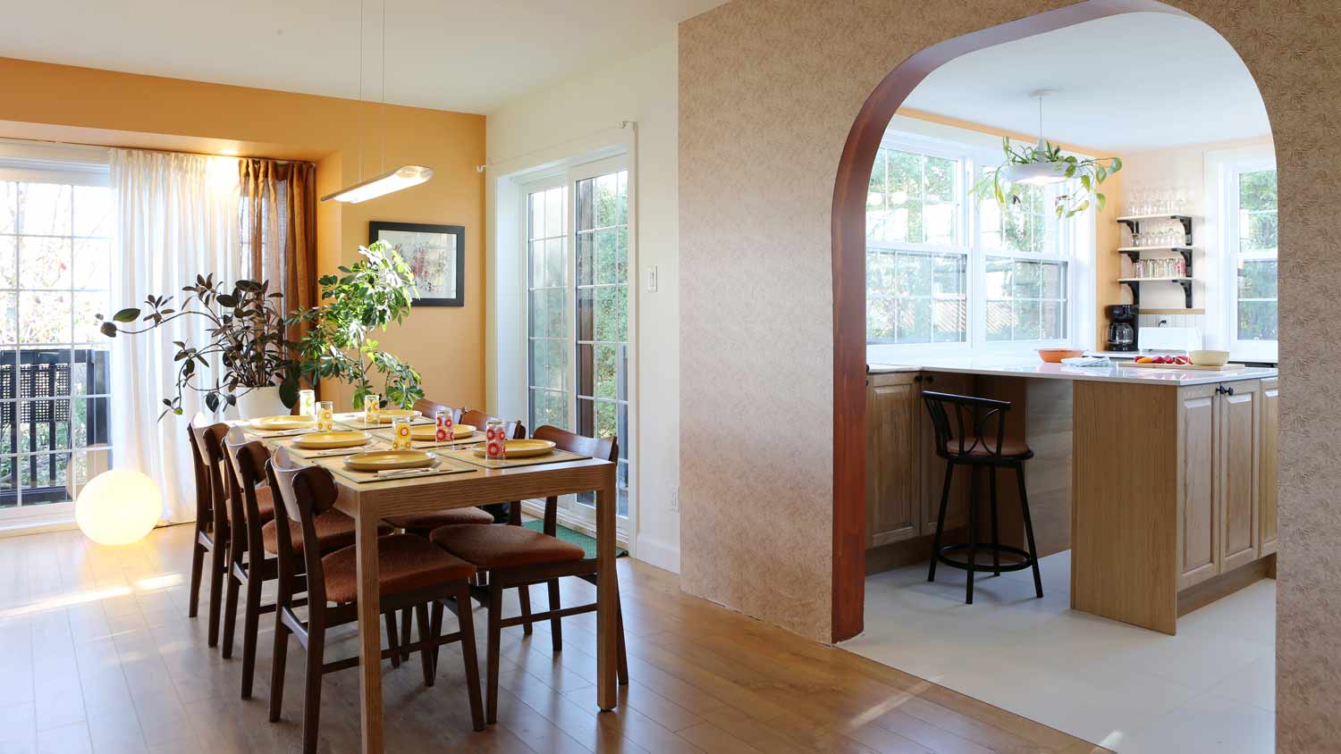 modern kitchen divided by dining room wall