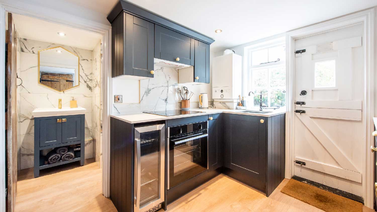 A kitchen with a dutch door