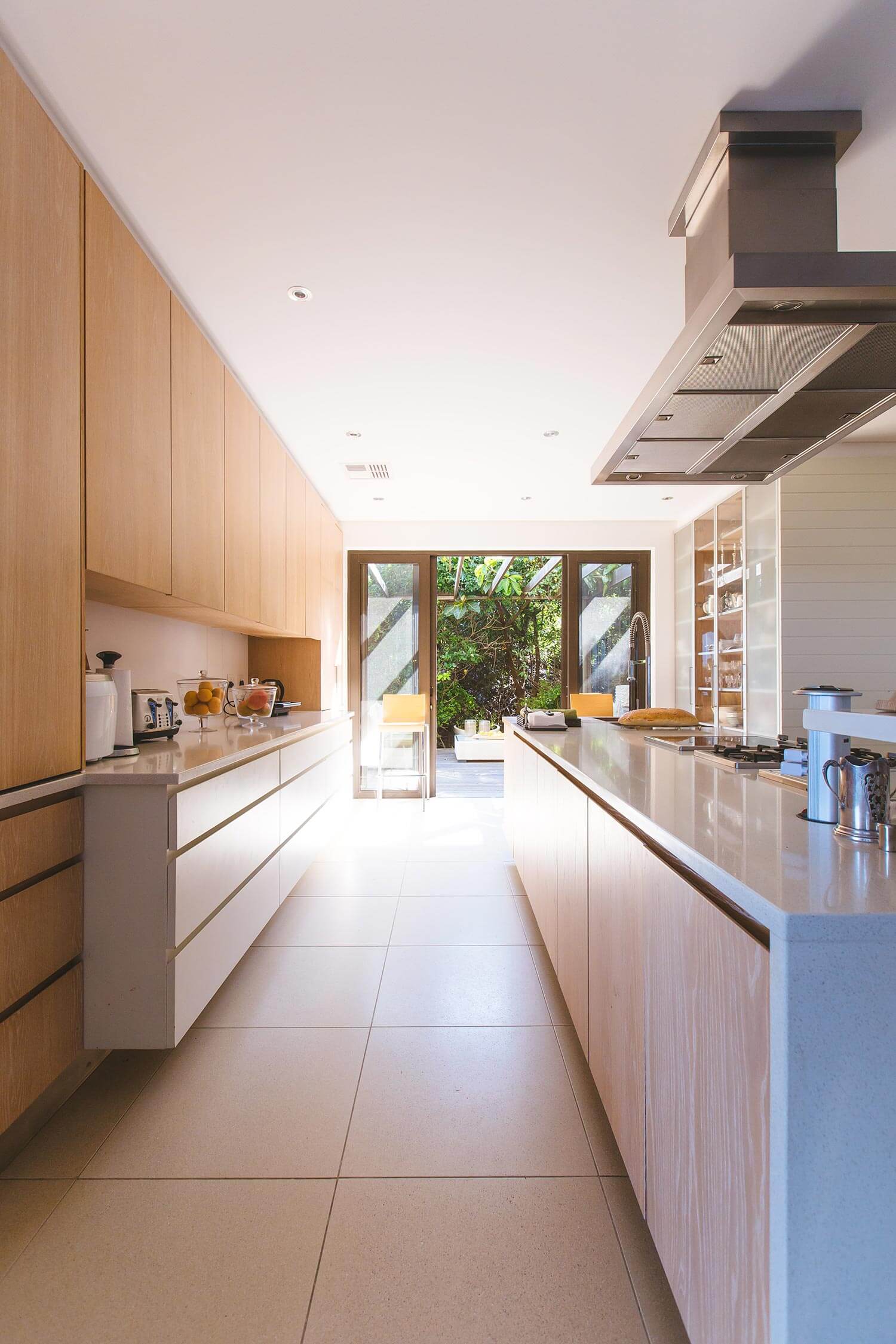 A kitchen with full length doors