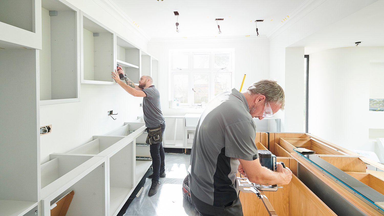 Team installing a kitchen