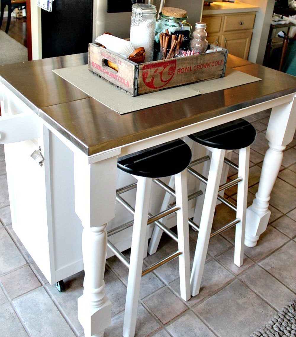 white kitchen island with legs