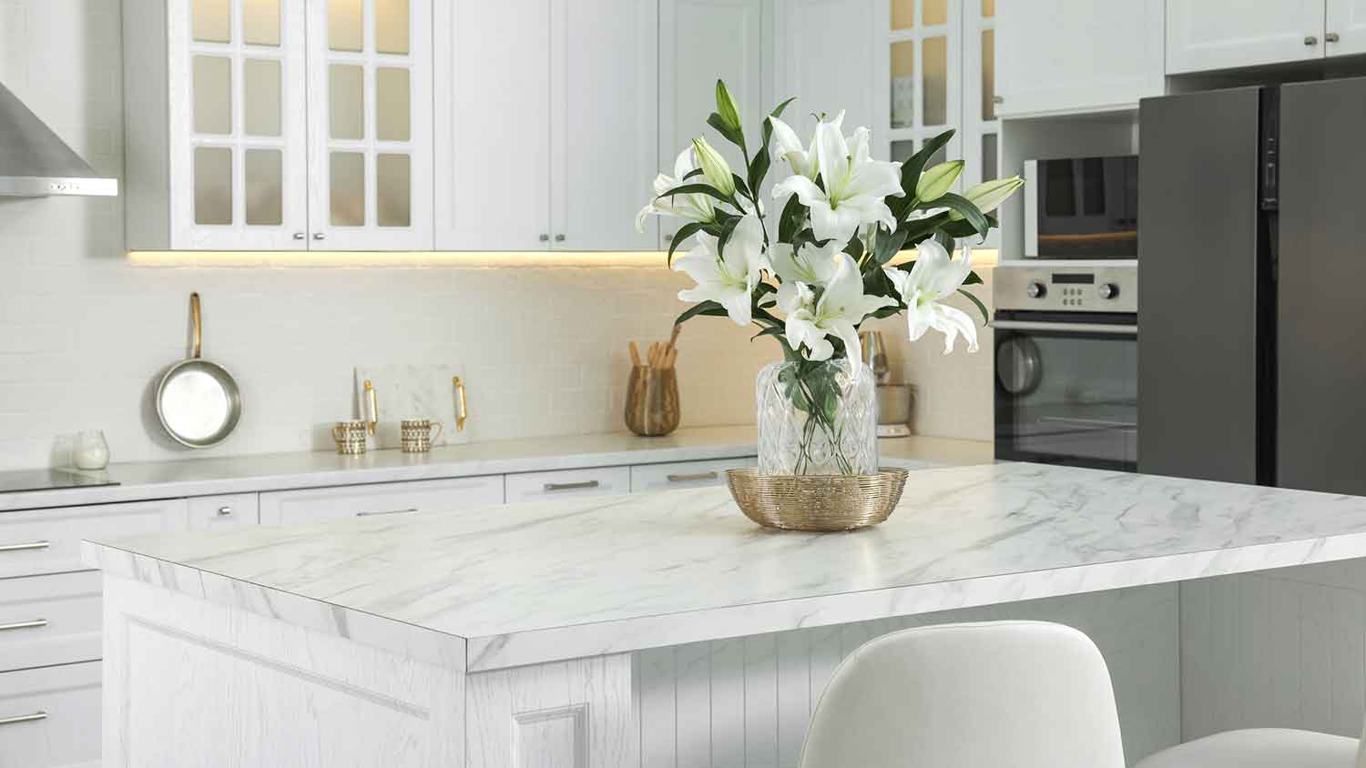 Kitchen island with white marble laminate countertop