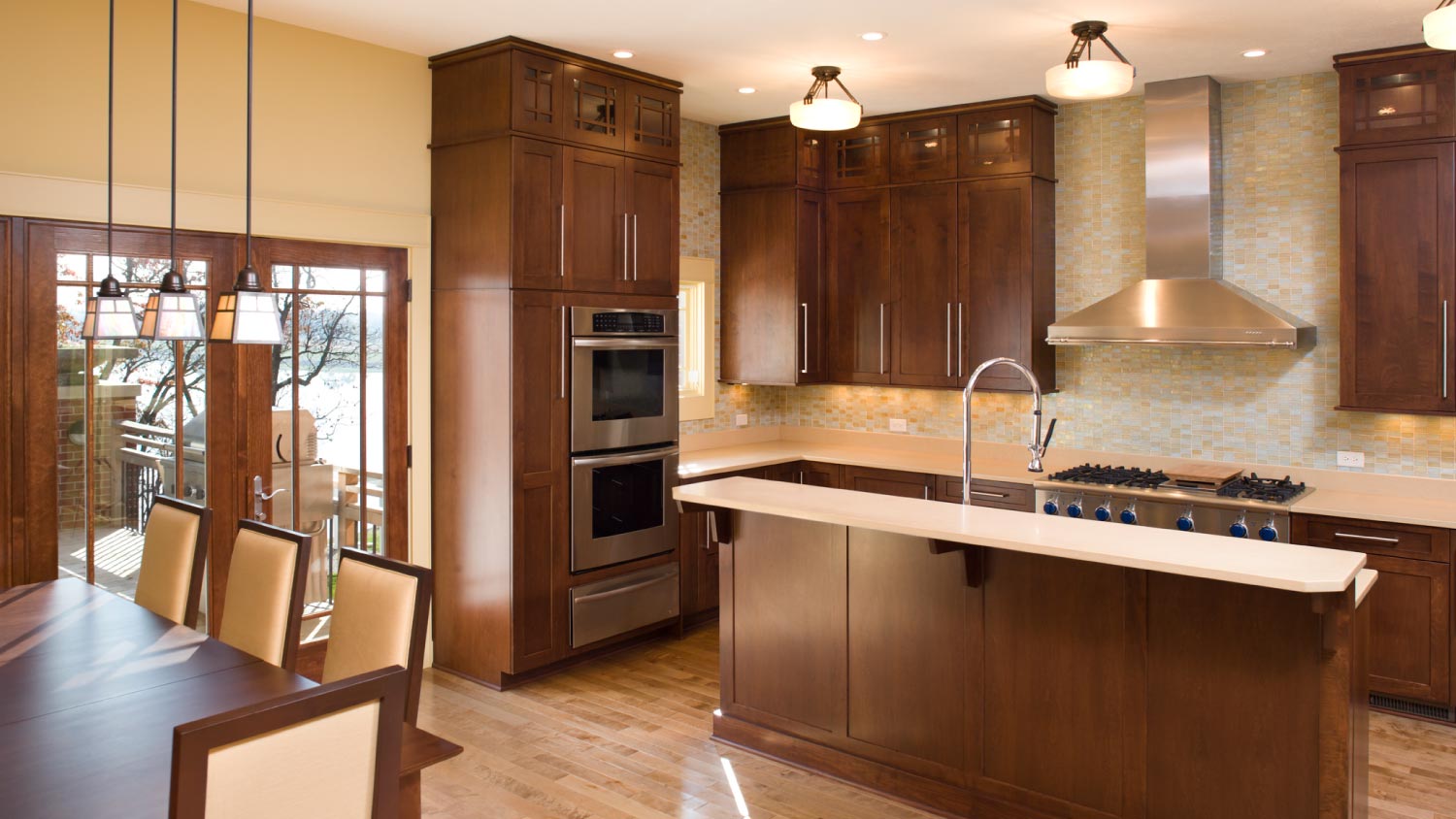 A kitchen with maple and stainless