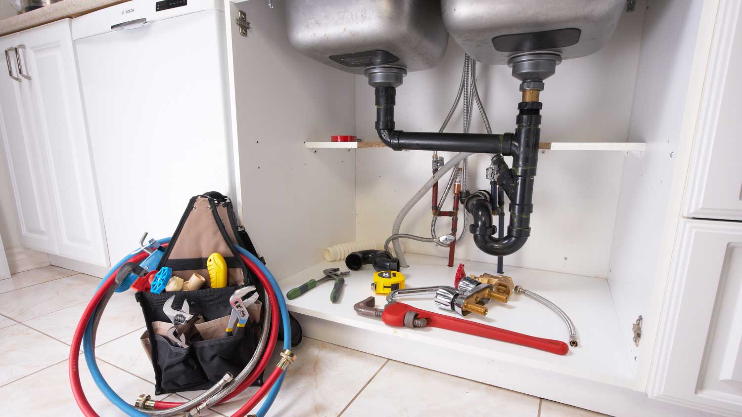 ABS plumbing pipes installed underneath kitchen sink