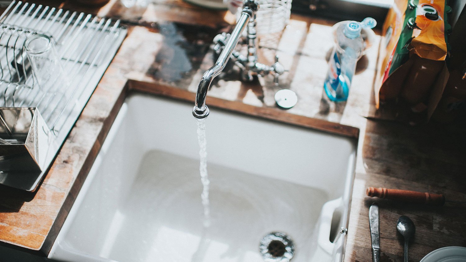 Kitchen sink with running water