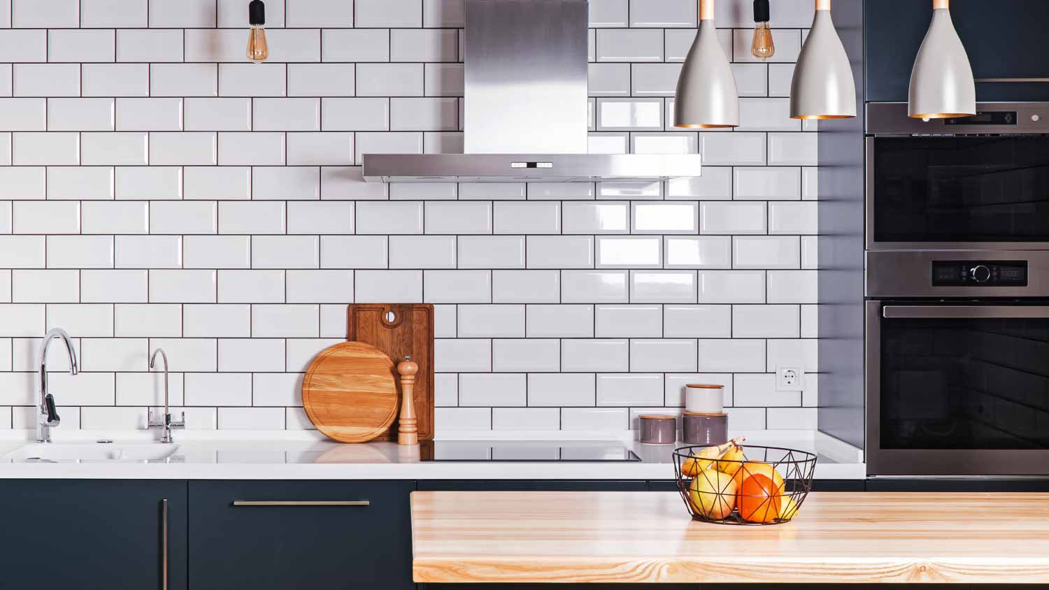 Kitchen with white brick tile wall