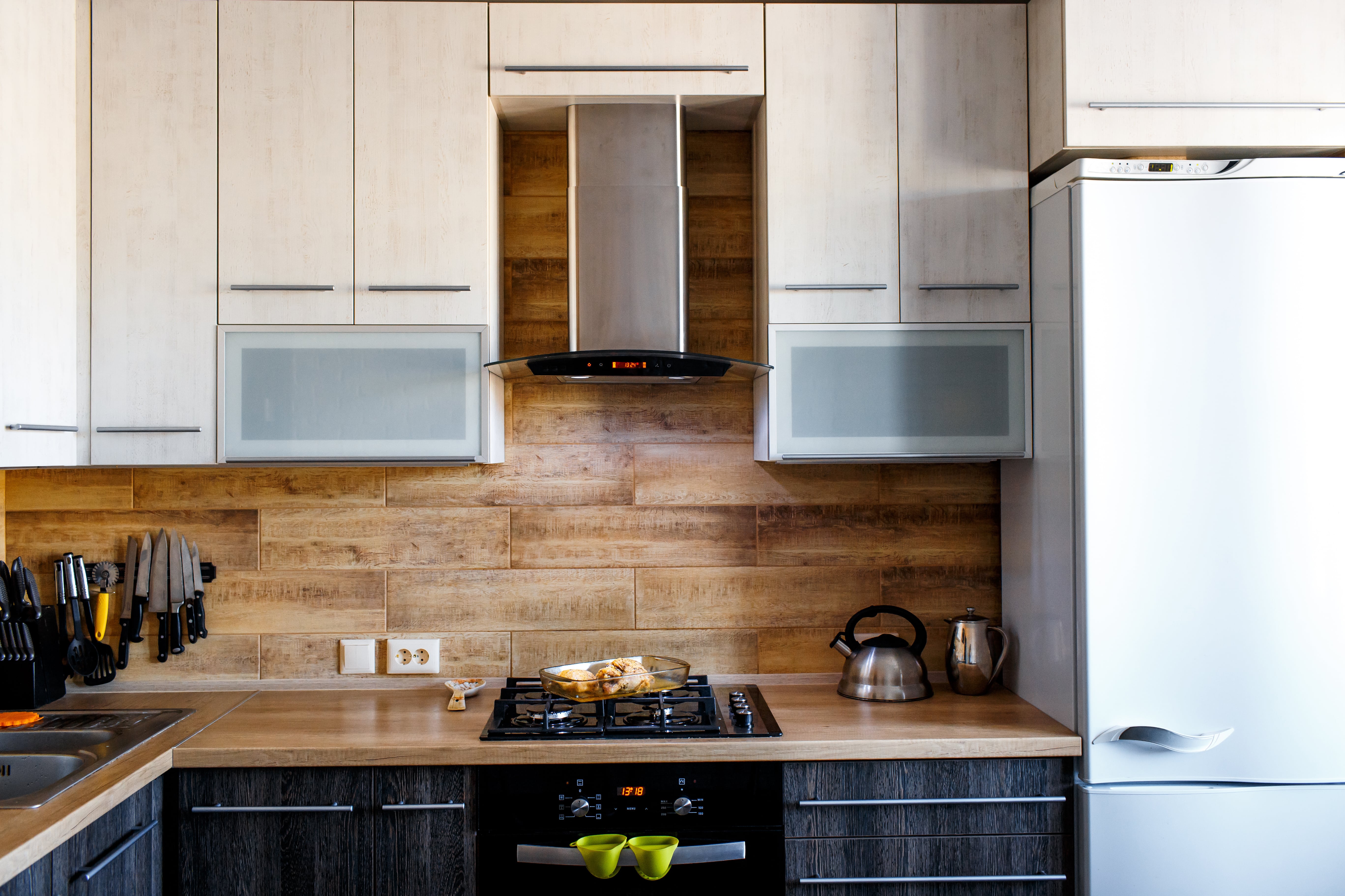 Frosted glass upper cabinet doors in kitchenette