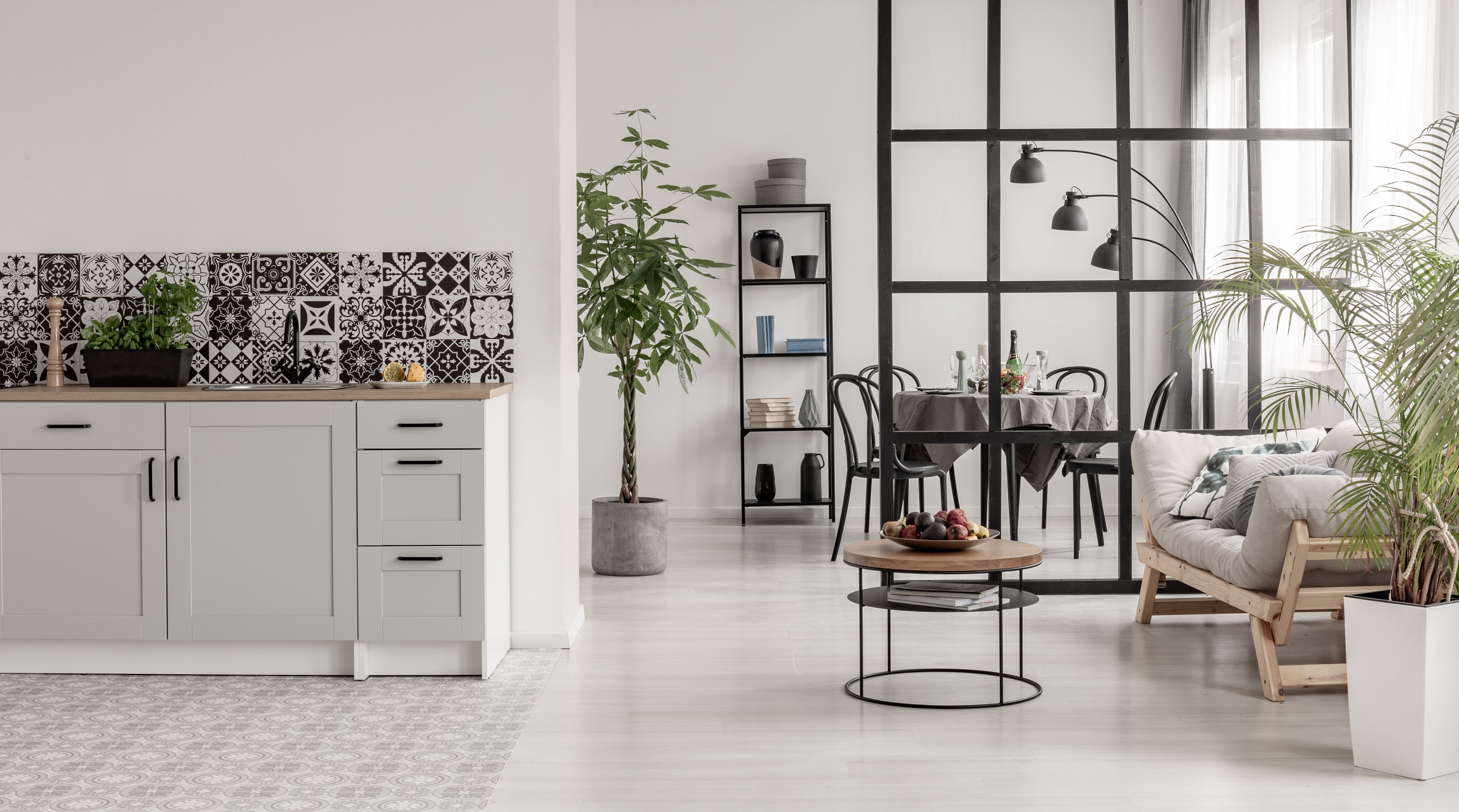 Tiled backsplash in modern kitchenette area