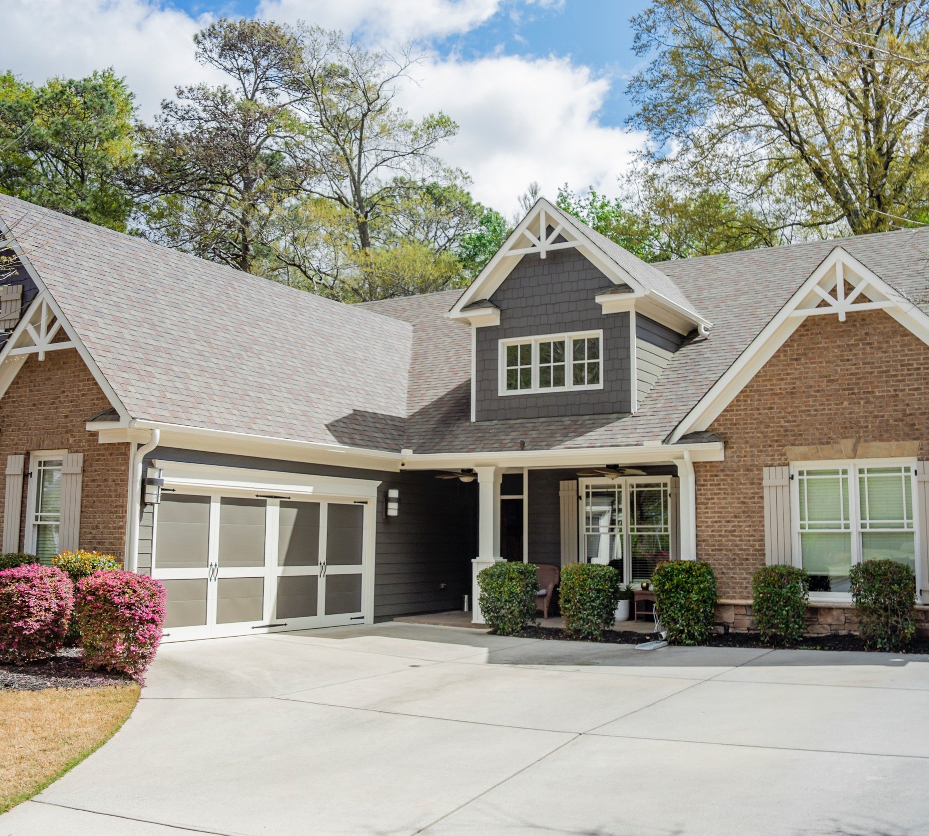 new home exterior with painted gutters