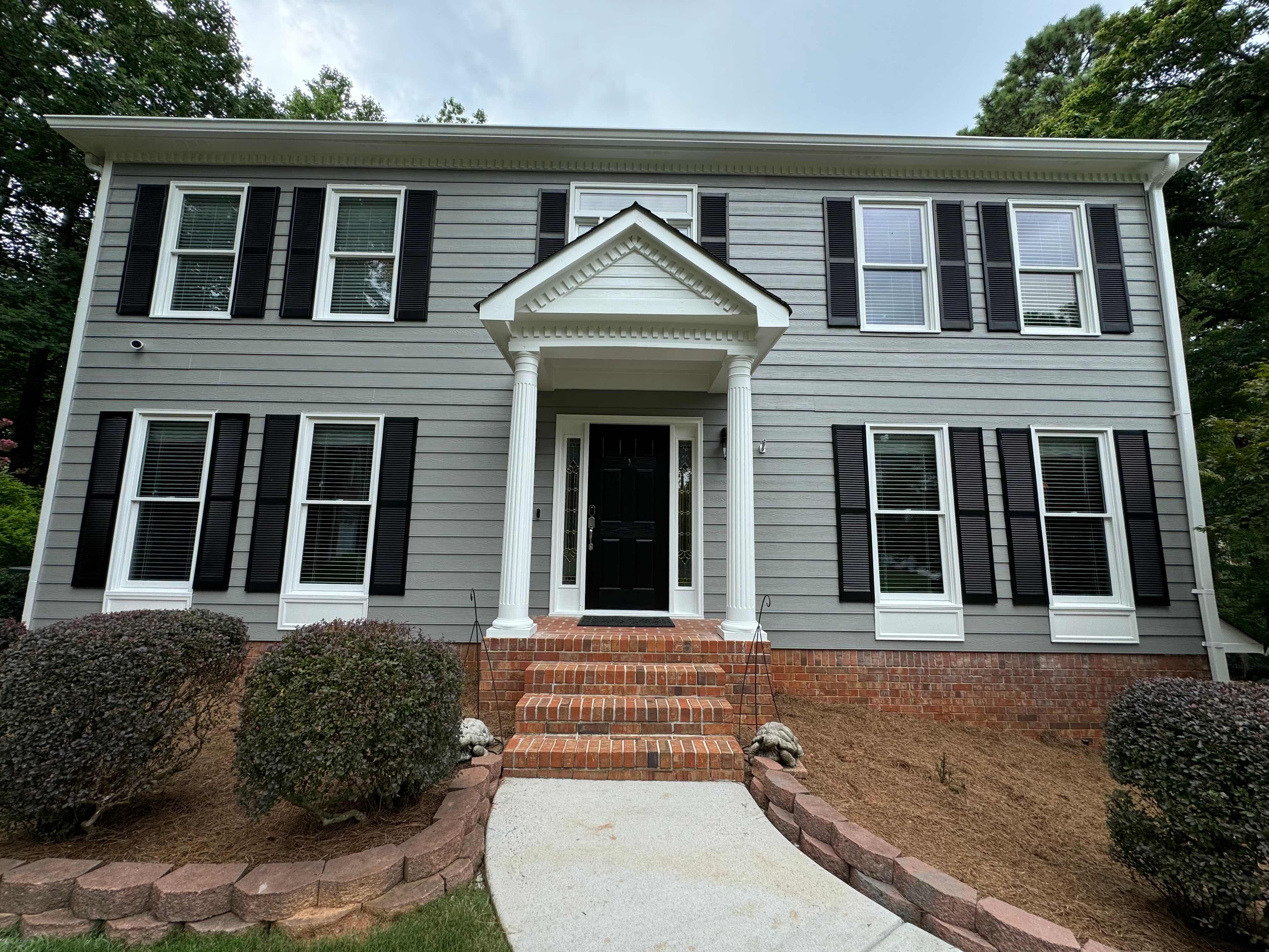 exterior of a house with painted gutters