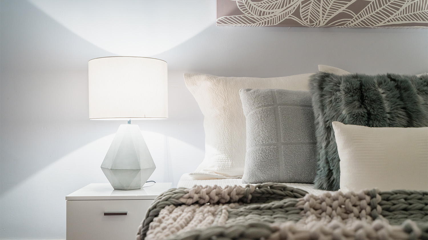 bedroom with lamp on nightstand