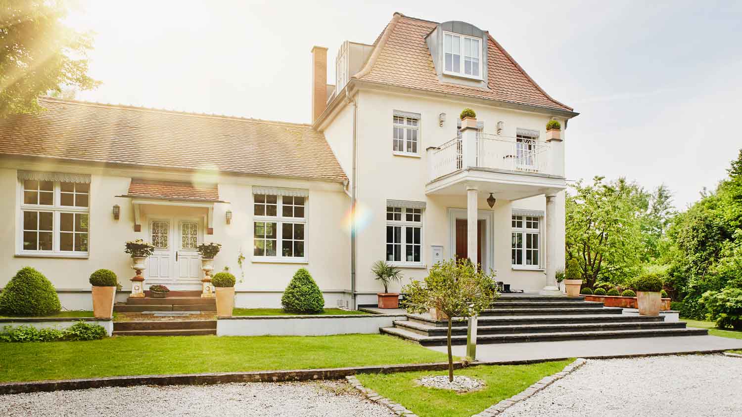 A large light beige house