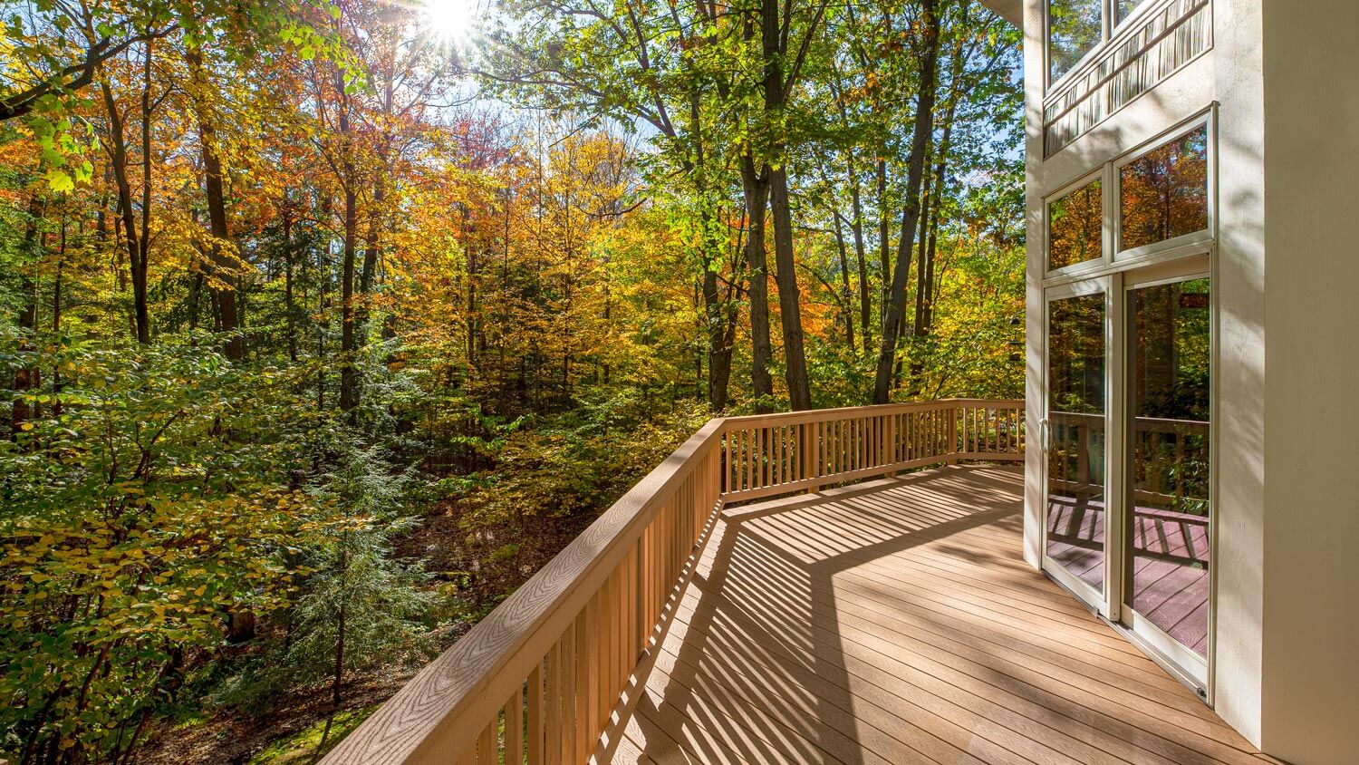 A large trex decking overlooking at nature