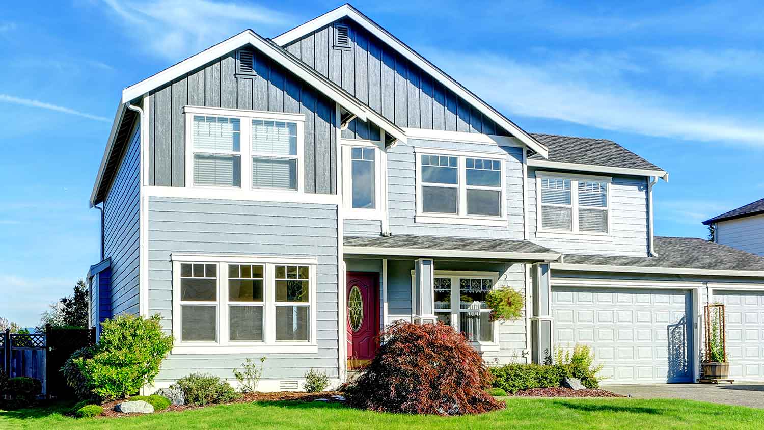 Two-story house with cement board siding
