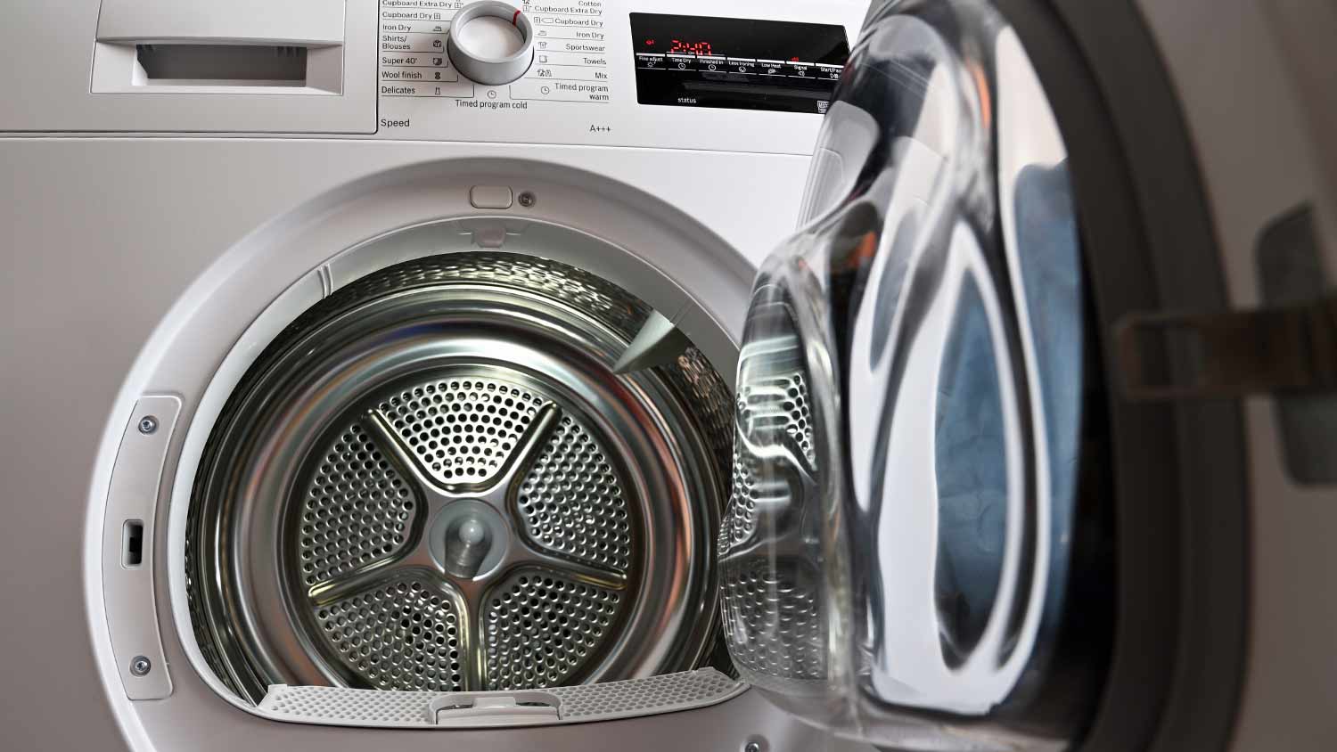 A laundry dryer with the door open