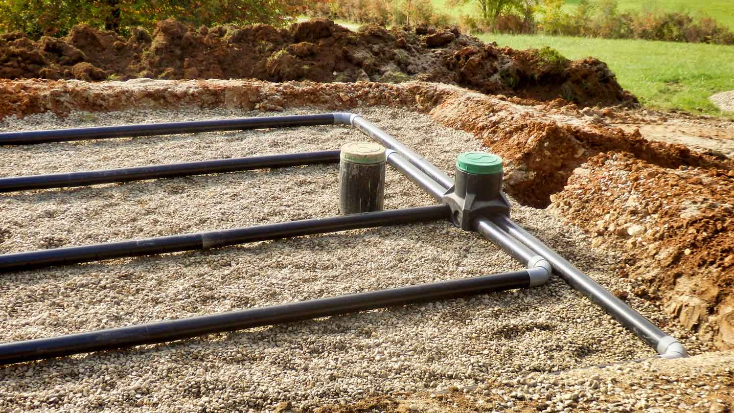 Leach field pipes sitting on top of a layer gravel