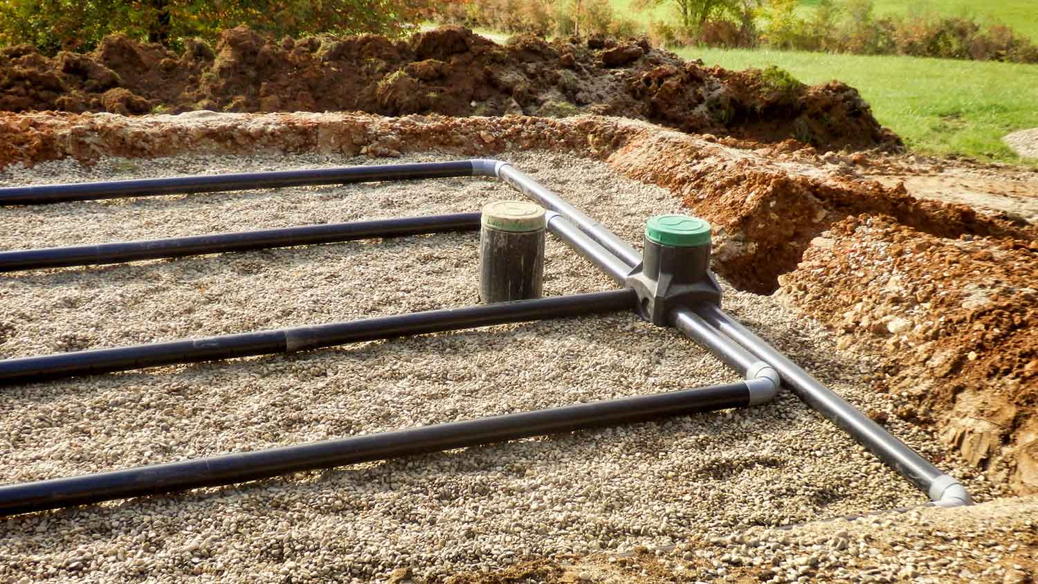 Leach field pipes sitting on top of a layer gravel 