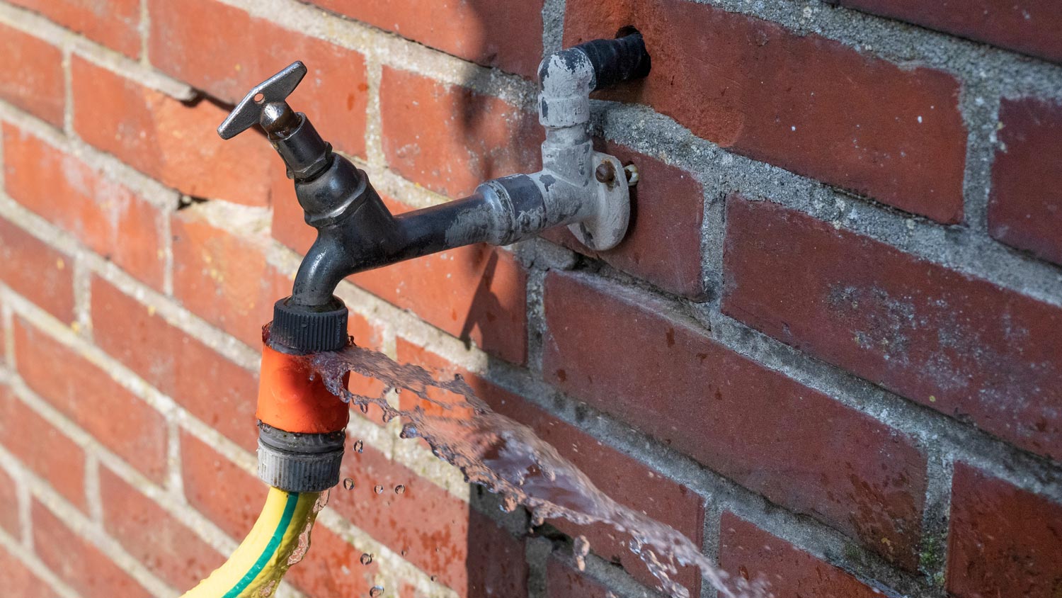 How To Change a Water Faucet Outside in a Brick Wall