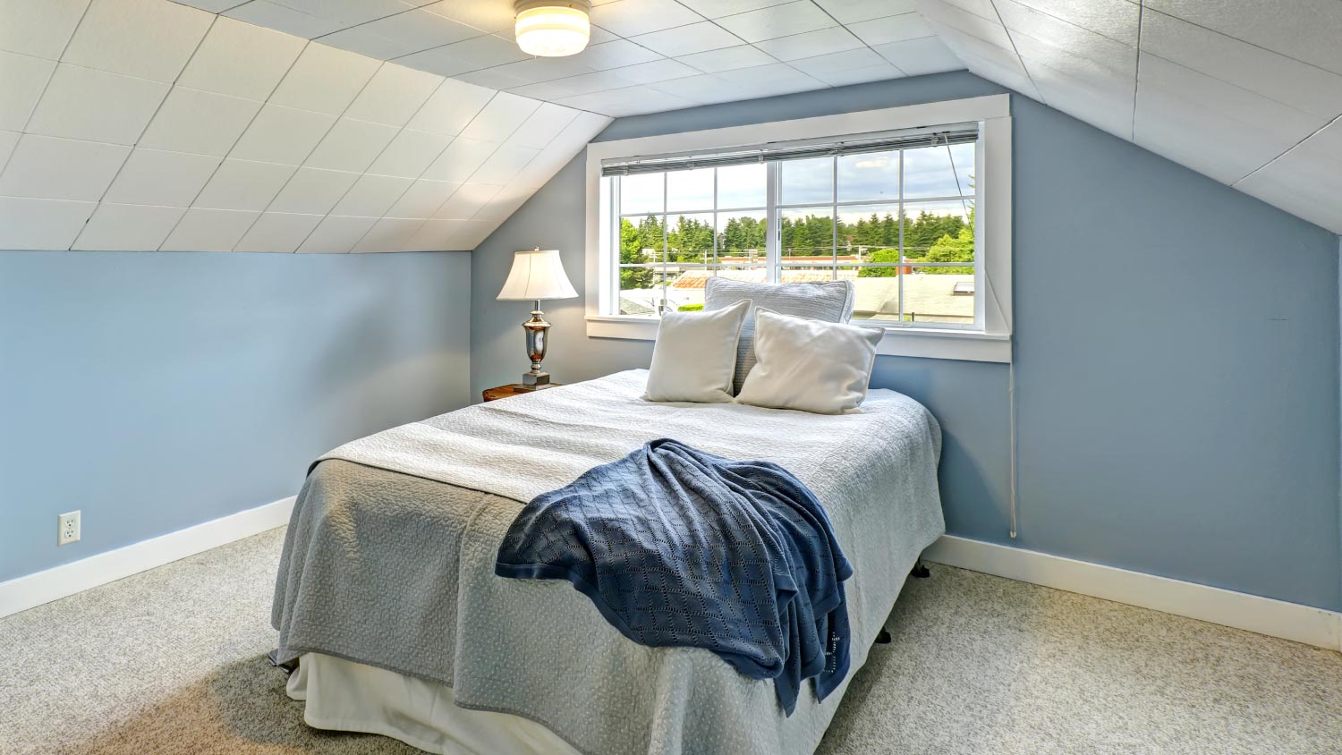 A light blue bedroom